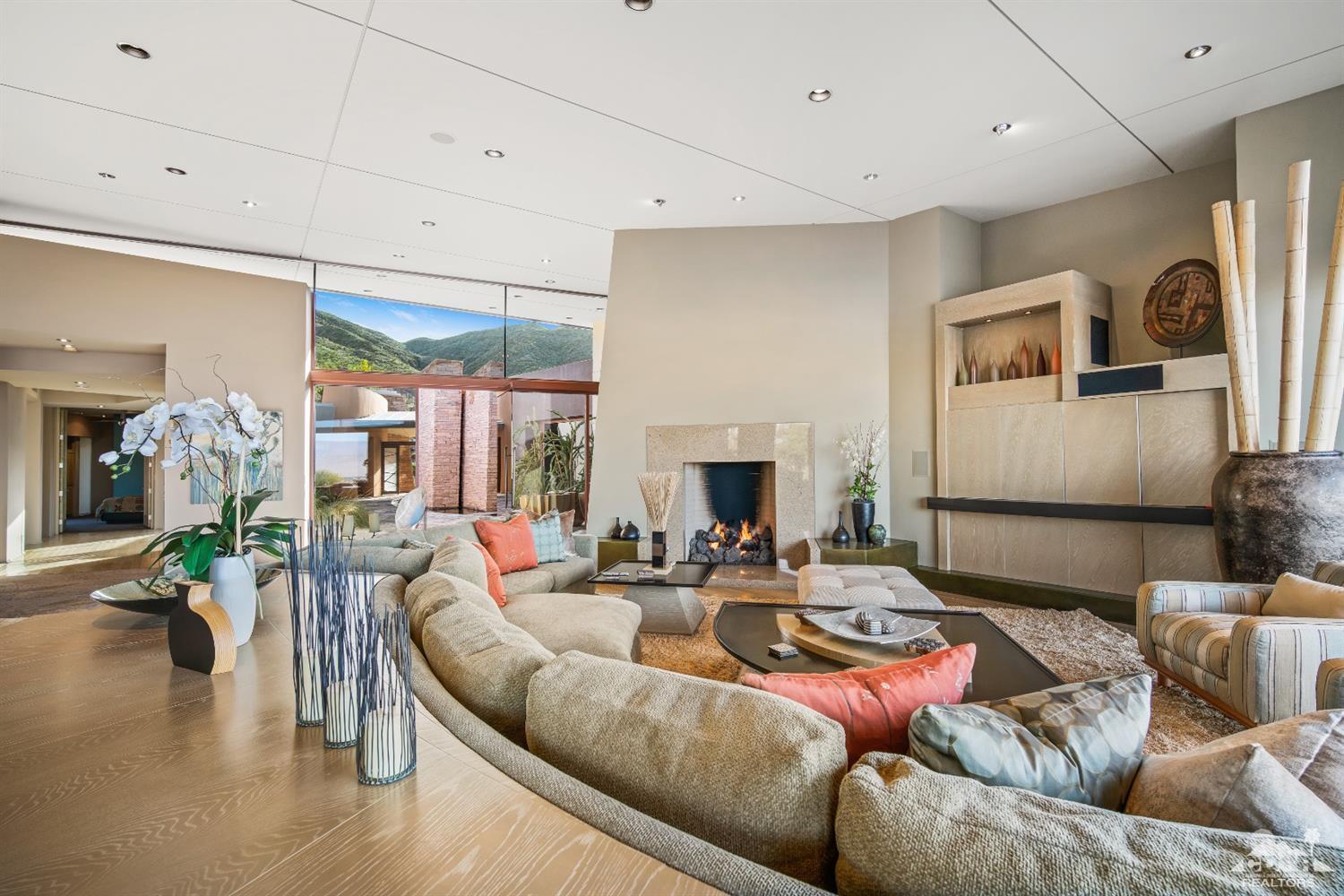 45 Sky Ridge Road Rancho Mirage, CA 92270 - Photo 48 of 90 a living room with furniture and a fireplace