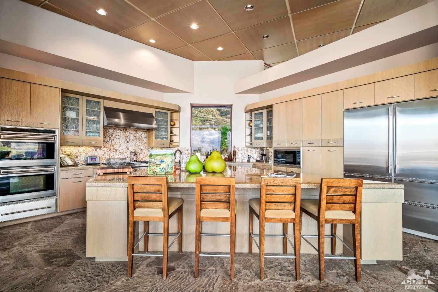 45 Sky Ridge Road Rancho Mirage, CA 92270 - Photo 53 of 90 a kitchen with counter space cabinets and appliances