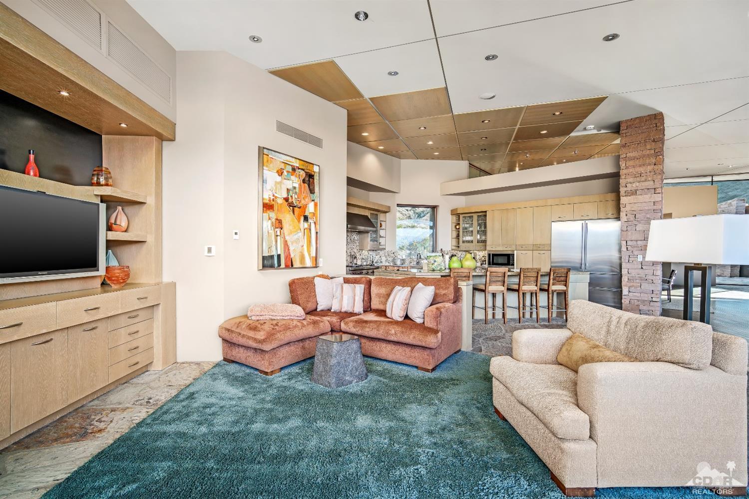 45 Sky Ridge Road Rancho Mirage, CA 92270 - Photo 55 of 90 a living room with furniture and a flat screen tv