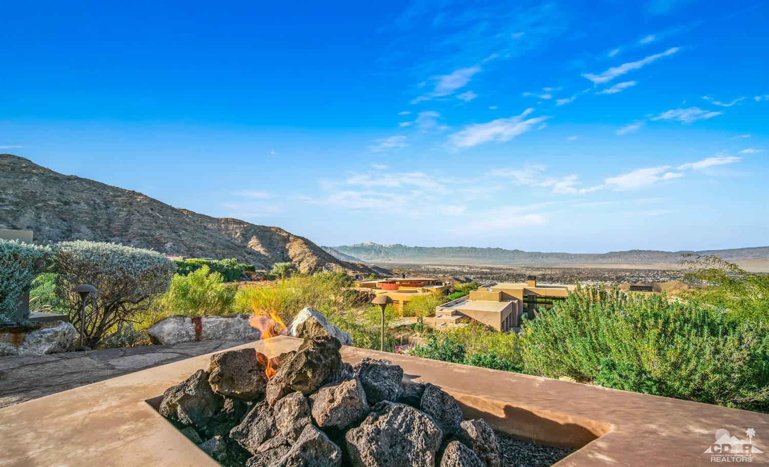 45 Sky Ridge Road Rancho Mirage, CA 92270 - Photo 63 of 90 a view of a lake with a mountain in the background