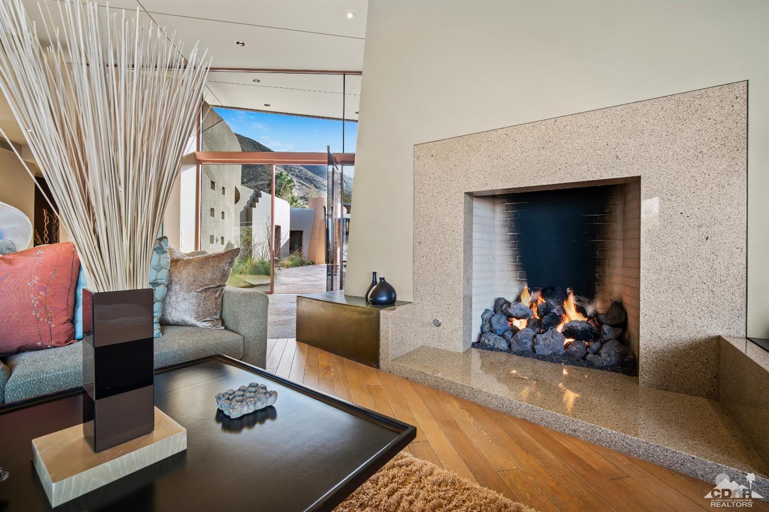 45 Sky Ridge Road Rancho Mirage, CA 92270 - Photo 64 of 90 a living room with furniture and a flat screen tv