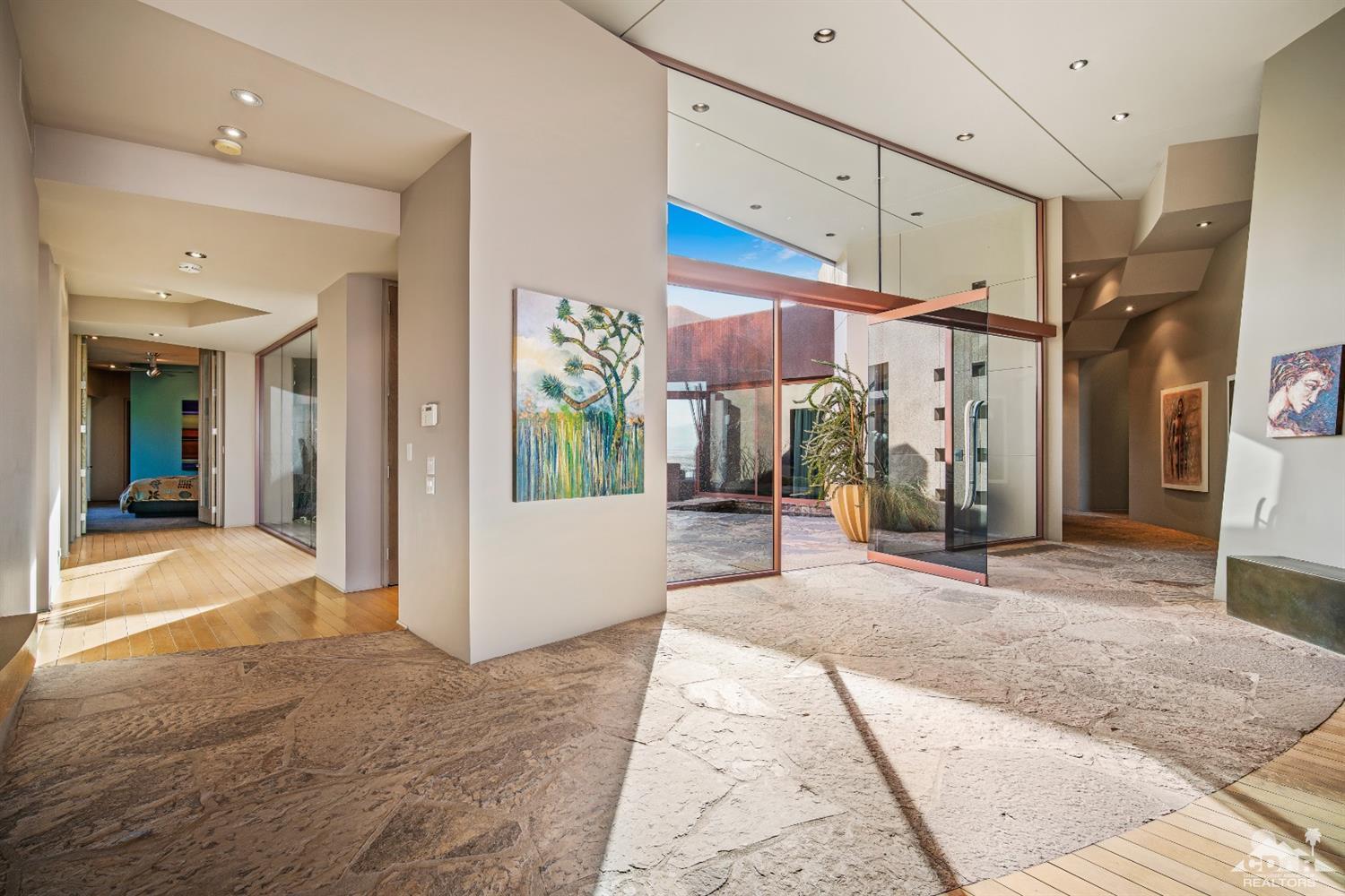 45 Sky Ridge Road Rancho Mirage, CA 92270 - Photo 65 of 90 a view of a hallway with wooden floor