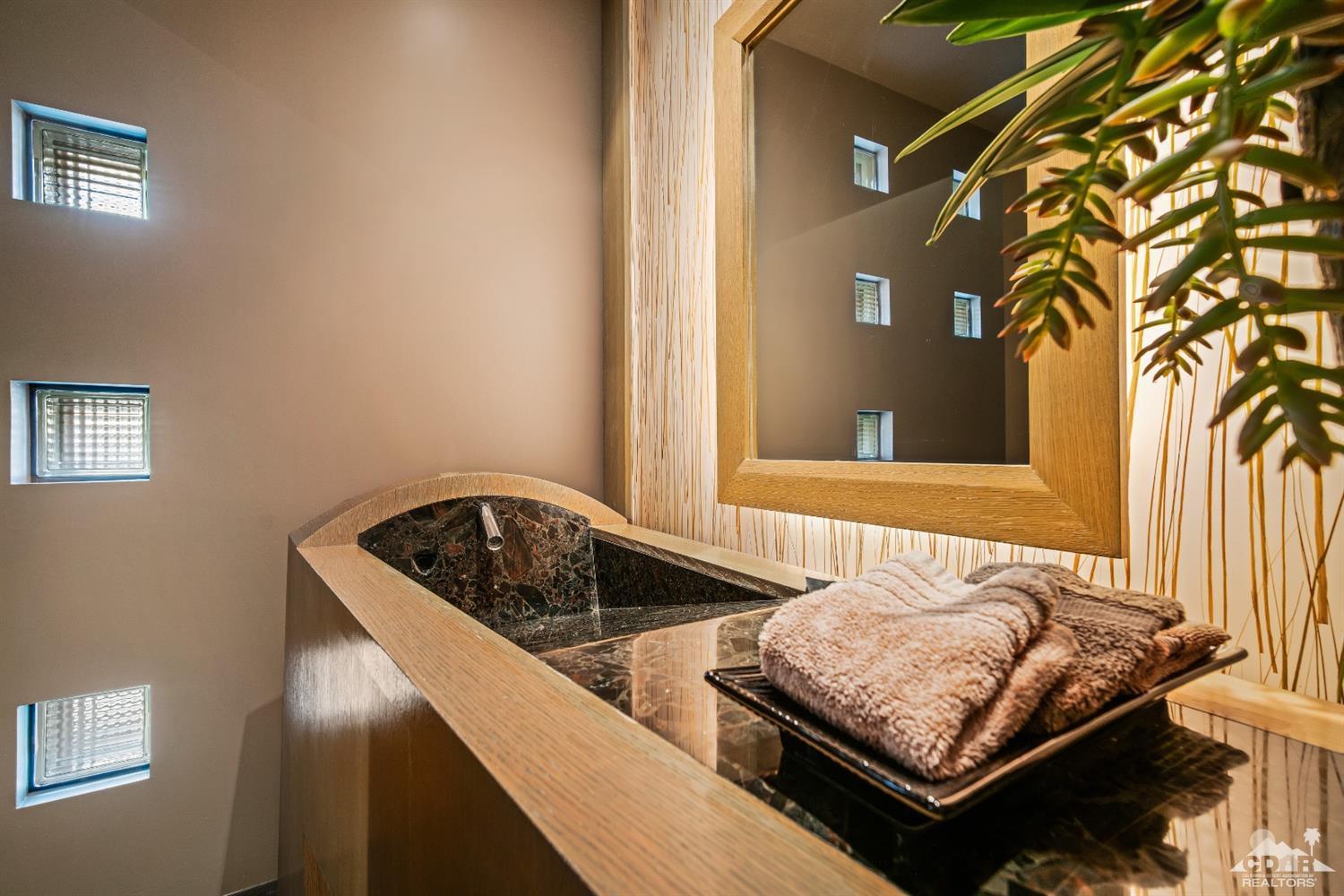 45 Sky Ridge Road Rancho Mirage, CA 92270 - Photo 67 of 90 a bedroom with a bed and a window