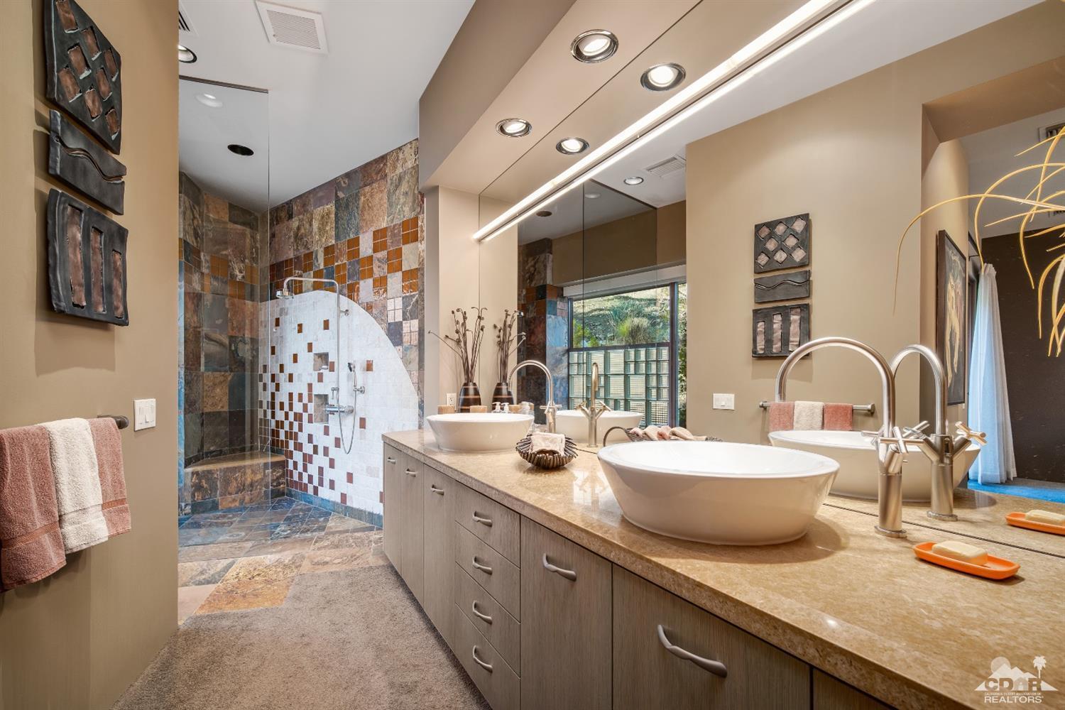 45 Sky Ridge Road Rancho Mirage, CA 92270 - Photo 90 of 90 a bathroom with a double vanity sink mirror and shower