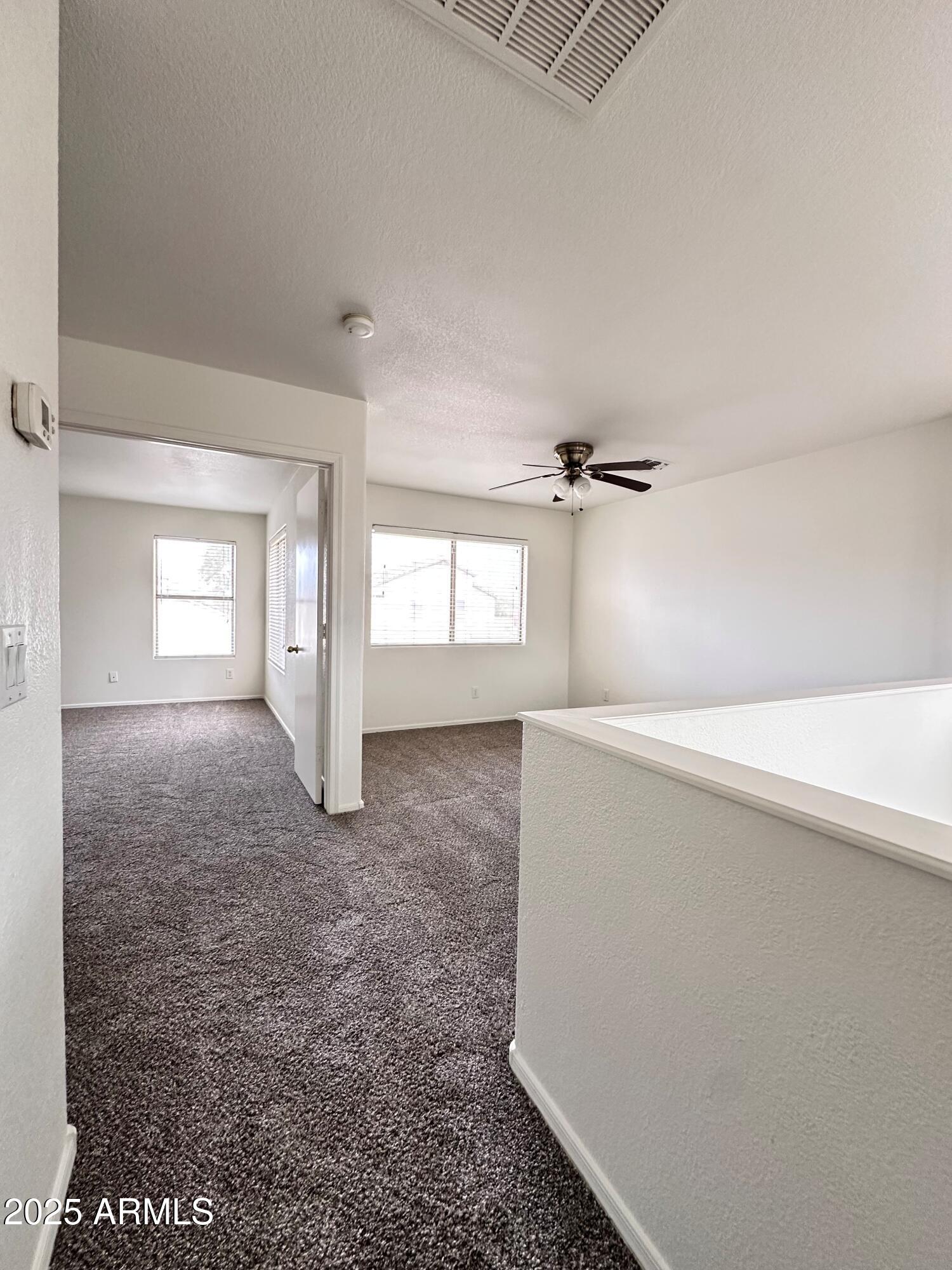 1782 East Del Rio Street Gilbert, AZ 85295 - Photo 11 of 23 wooden floor in an empty room