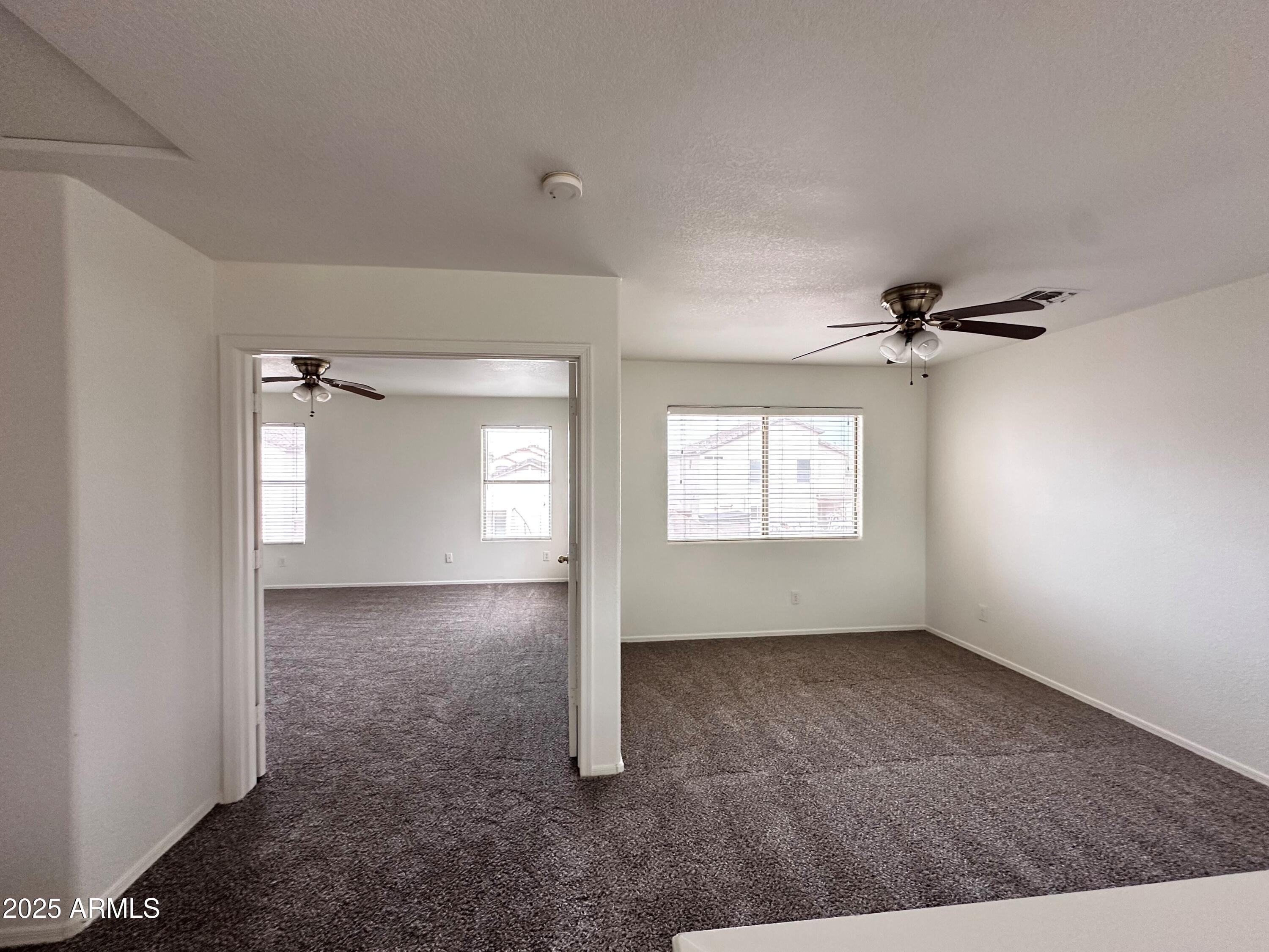 1782 East Del Rio Street Gilbert, AZ 85295 - Photo 12 of 23 an empty room with windows and closet