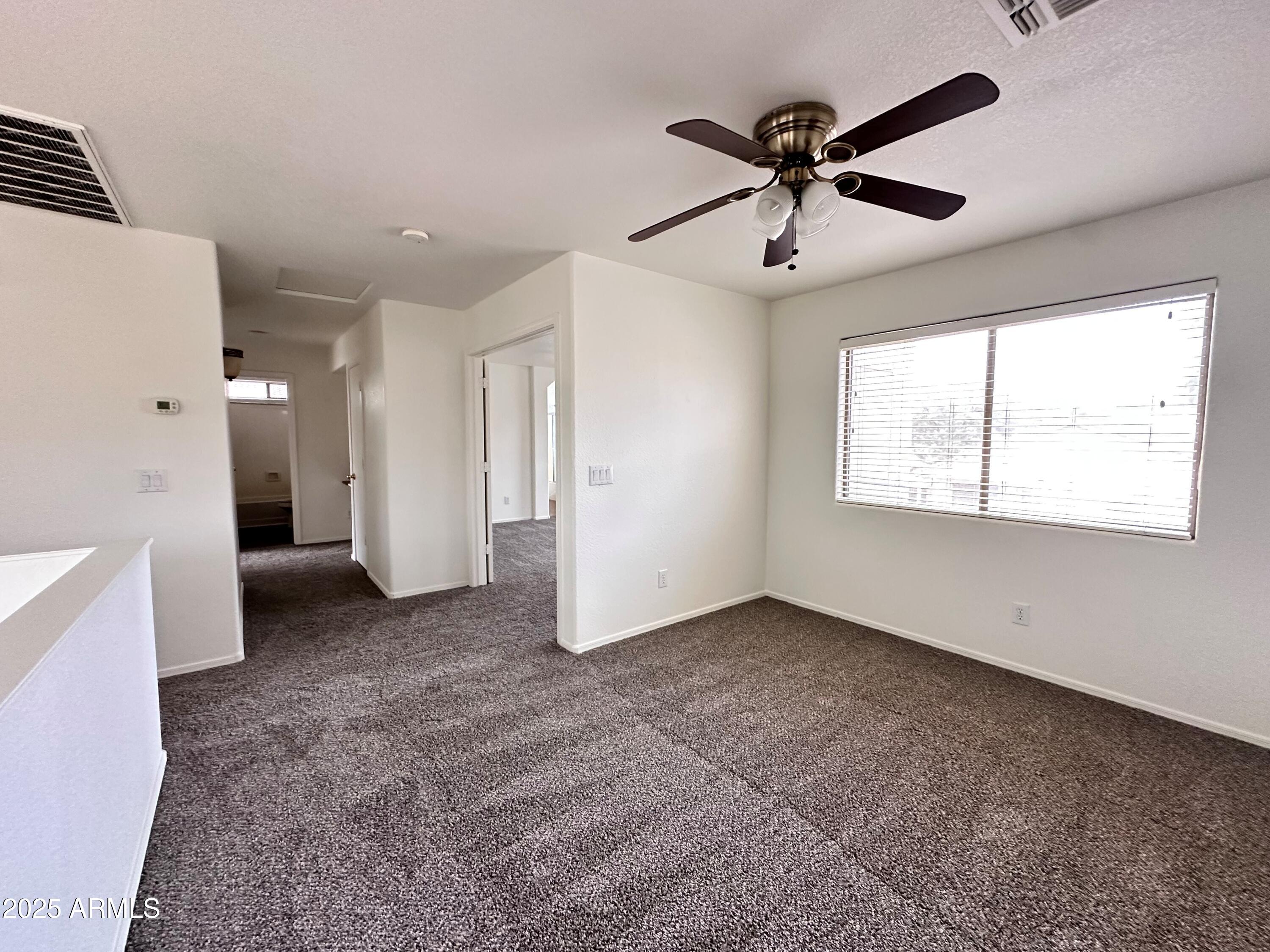 1782 East Del Rio Street Gilbert, AZ 85295 - Photo 13 of 23 a view of an empty room with a window