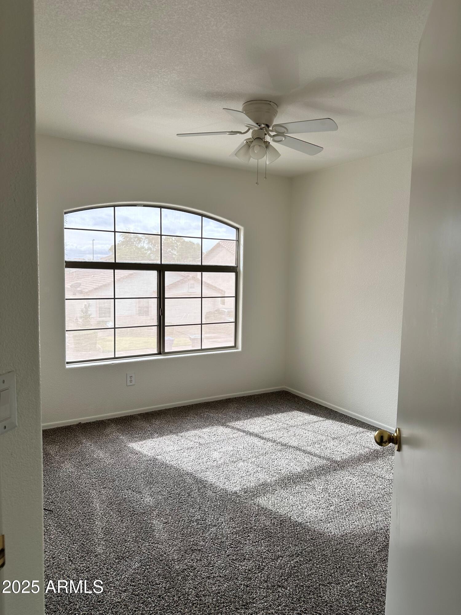 1782 East Del Rio Street Gilbert, AZ 85295 - Photo 17 of 23 a view of an empty room with a window