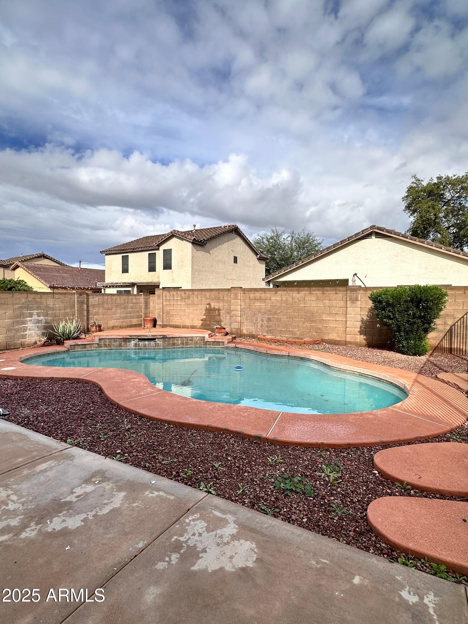 1782 East Del Rio Street Gilbert, AZ 85295 - Photo 23 of 23 a view of a big house with a big yard and potted plants