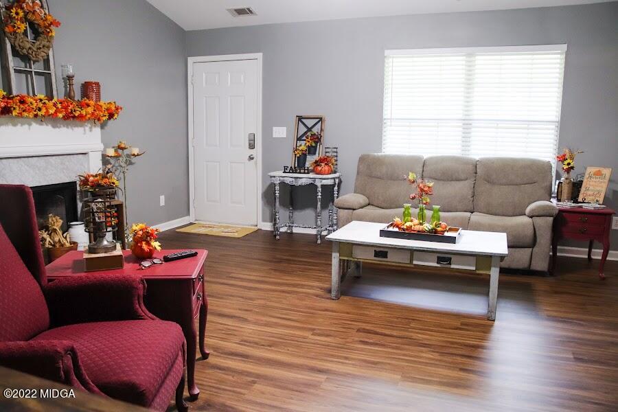 3336 Trotters Ridge Trail Gray, GA 31032 - Photo 5 of 16 a living room with furniture and a fireplace