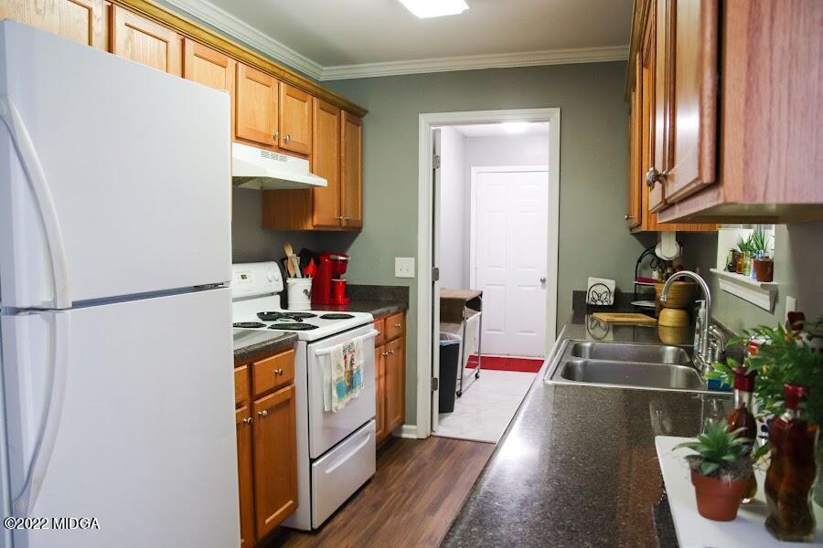 3336 Trotters Ridge Trail Gray, GA 31032 - Photo 6 of 16 a kitchen with stainless steel appliances a stove and a refrigerator