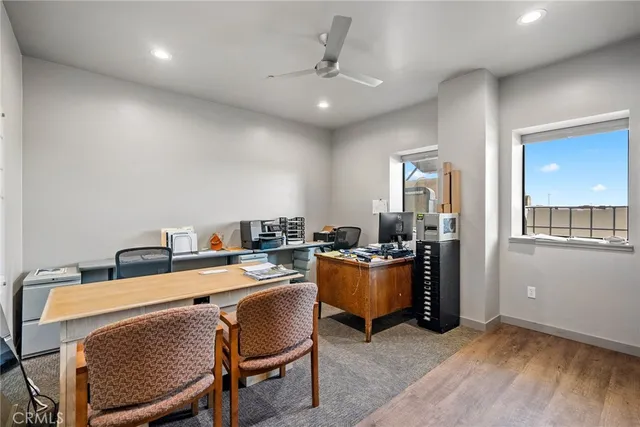 a view of a livingroom with furniture