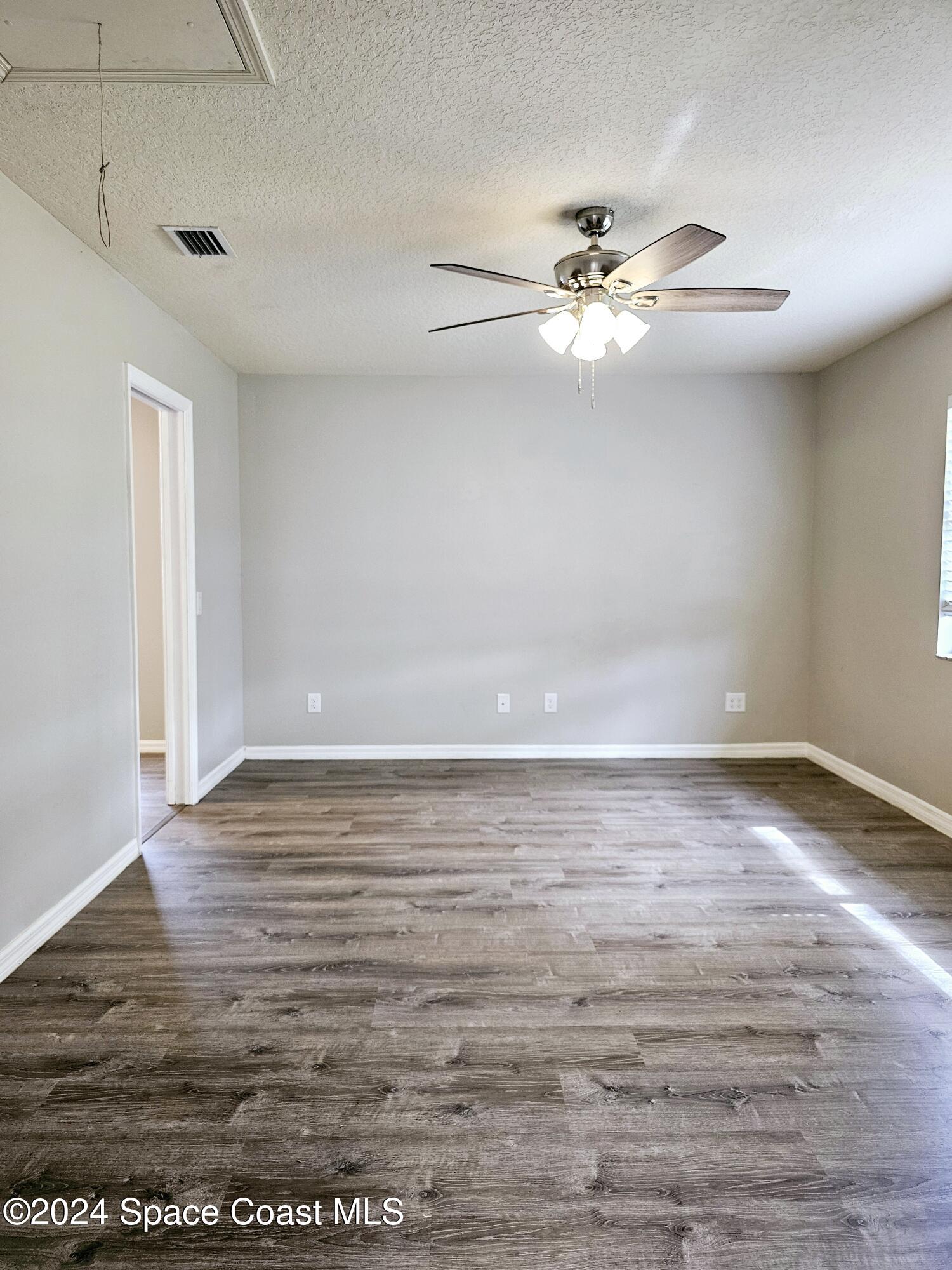 130 Abalone Road Northwest Palm Bay, FL 32907 - Photo 12 of 32 Family Room
