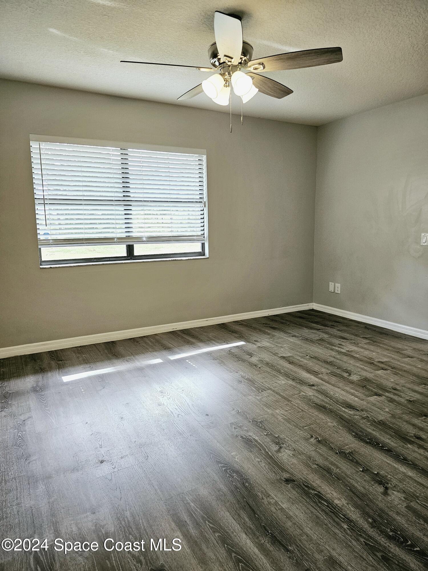 130 Abalone Road Northwest Palm Bay, FL 32907 - Photo 13 of 32 Family Room