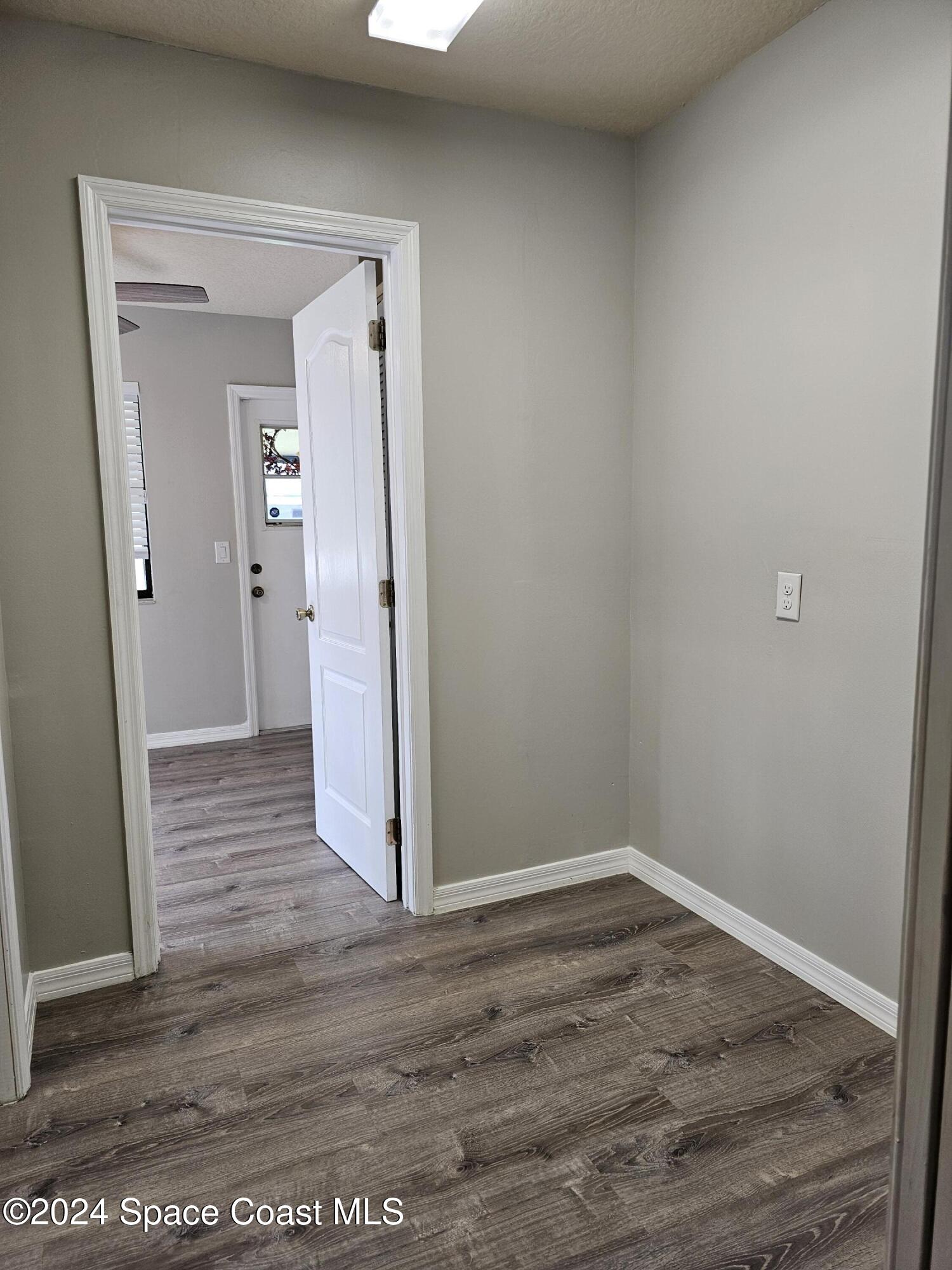 130 Abalone Road Northwest Palm Bay, FL 32907 - Photo 29 of 32 mud room off laundry