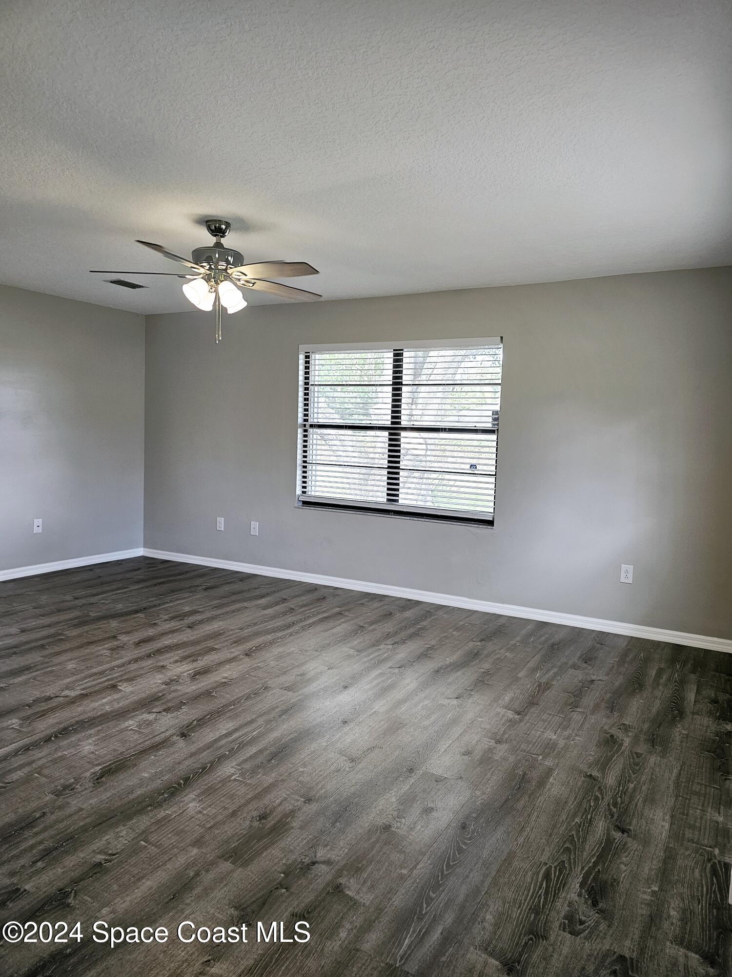 130 Abalone Road Northwest Palm Bay, FL 32907 - Photo 4 of 32 Living Room