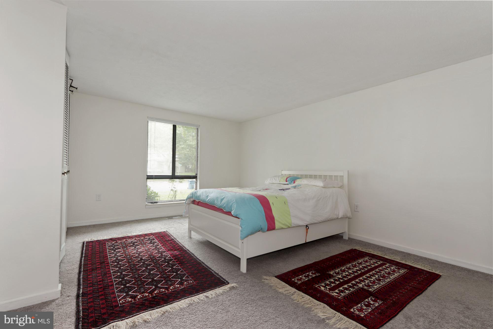 2233 Sanibel Drive Reston, VA 20191 - Photo 17 of 34 master bedroom with bed