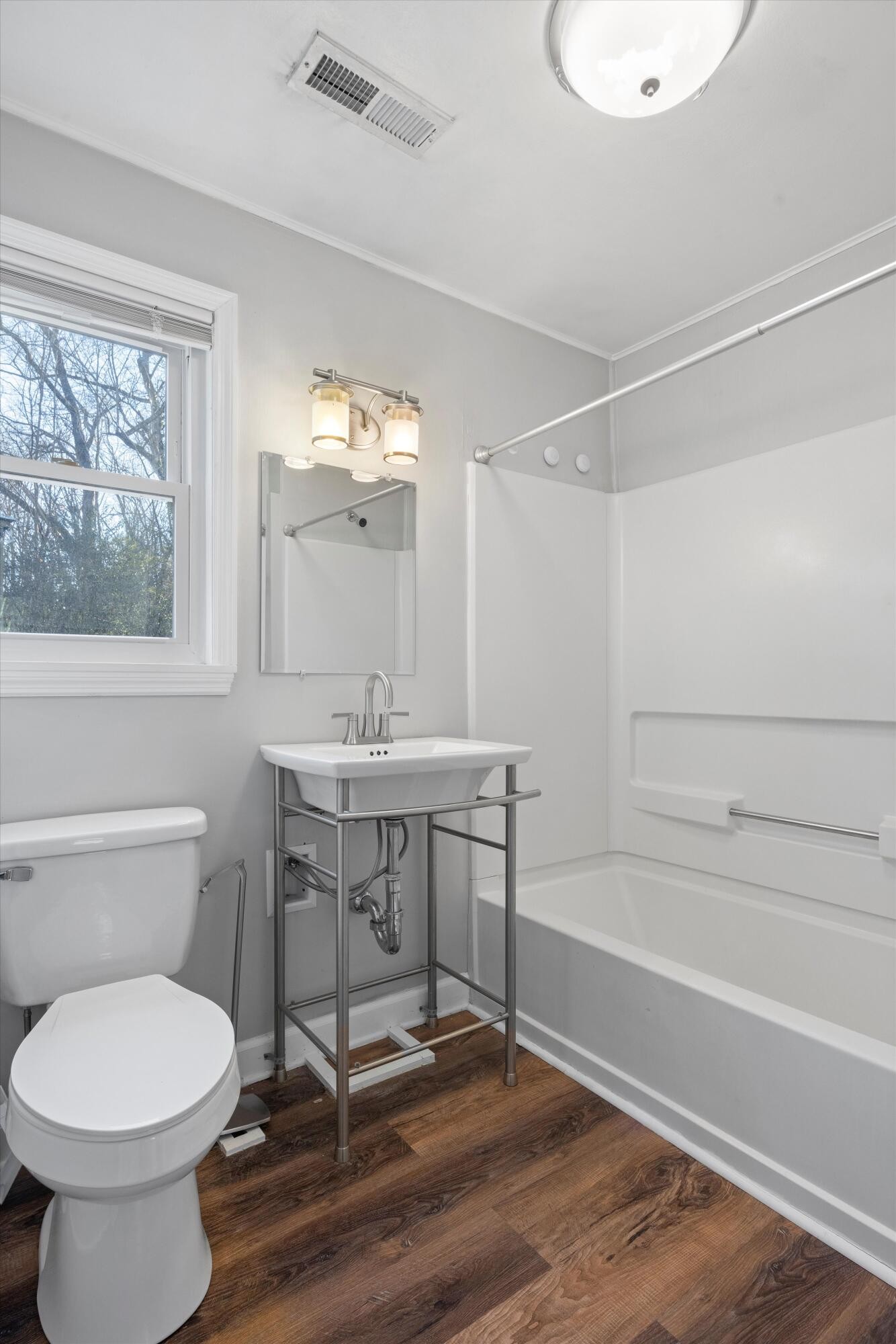 420 West Cloud Springs Road Rossville, GA 30741 - Photo 15 of 16 a bathroom with a toilet a sink and a bathtub