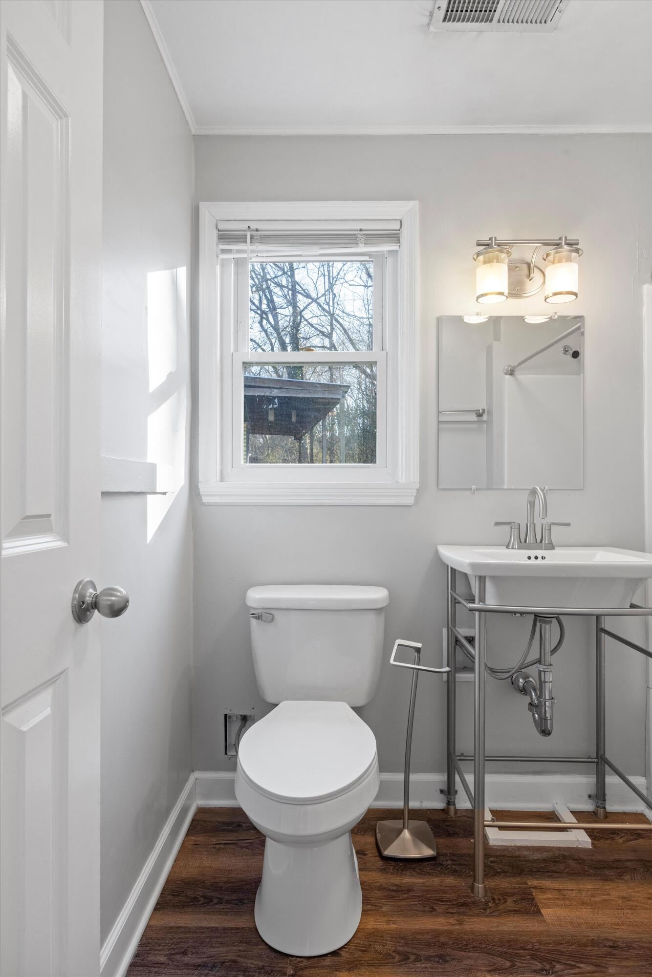420 West Cloud Springs Road Rossville, GA 30741 - Photo 16 of 16 a bathroom with a toilet a sink and mirror