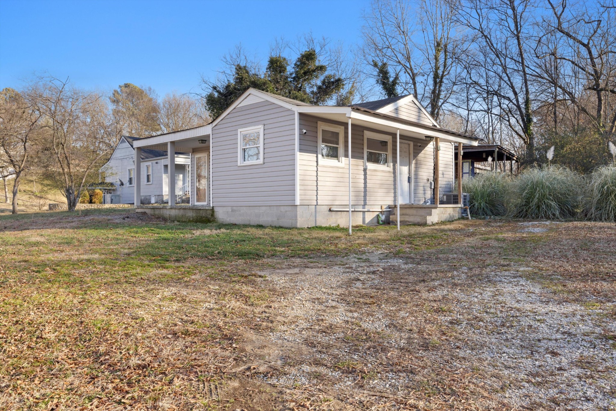 420 West Cloud Springs Road Rossville, GA 30741 - Photo 3 of 16 a front view of a house with a yard