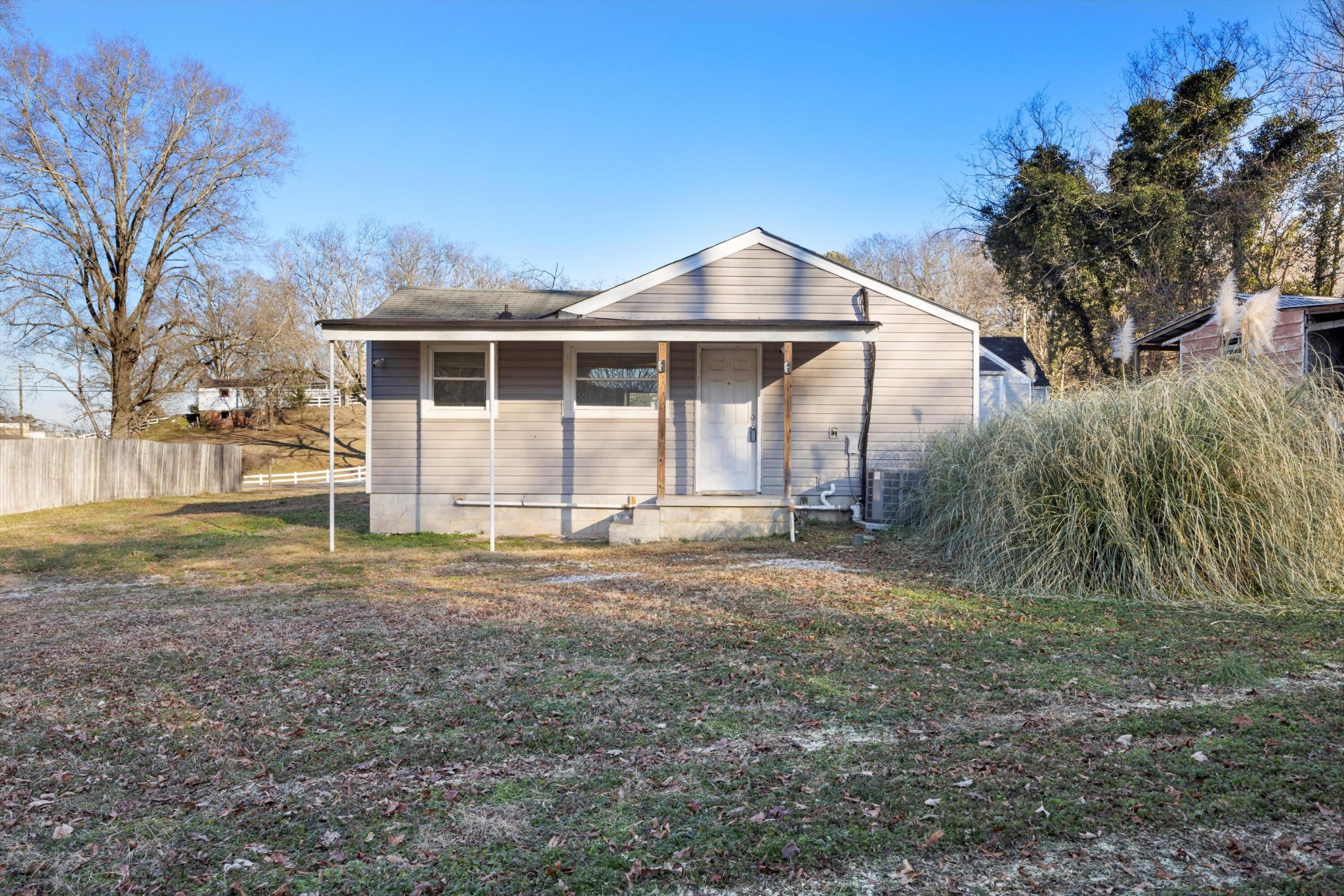 420 West Cloud Springs Road Rossville, GA 30741 - Photo 4 of 16 a front view of a house with a yard