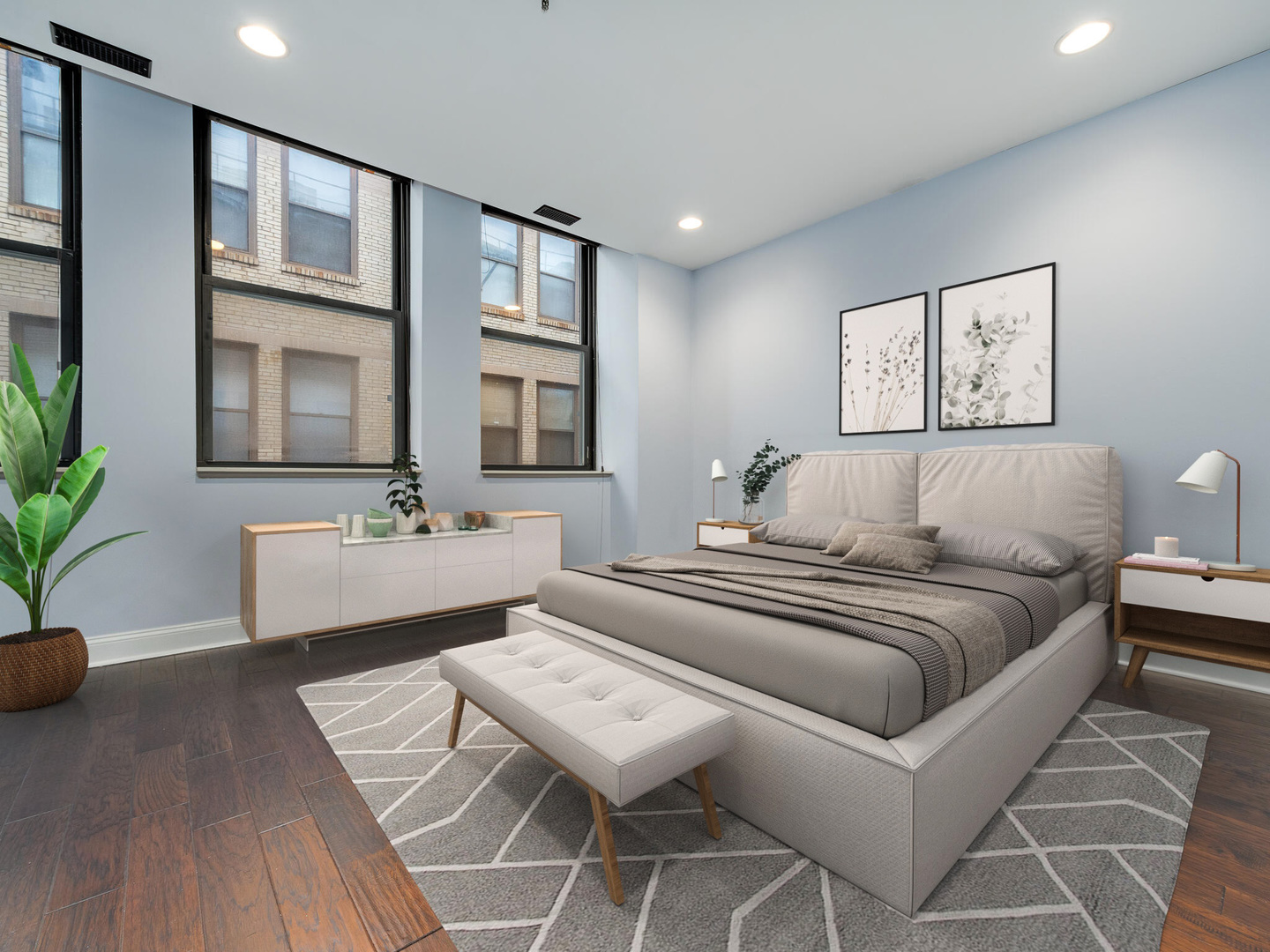 640 South Federal Street, Unit 708 Chicago, IL 60605 - Photo 15 of 20 a bedroom with a large bed and a couch