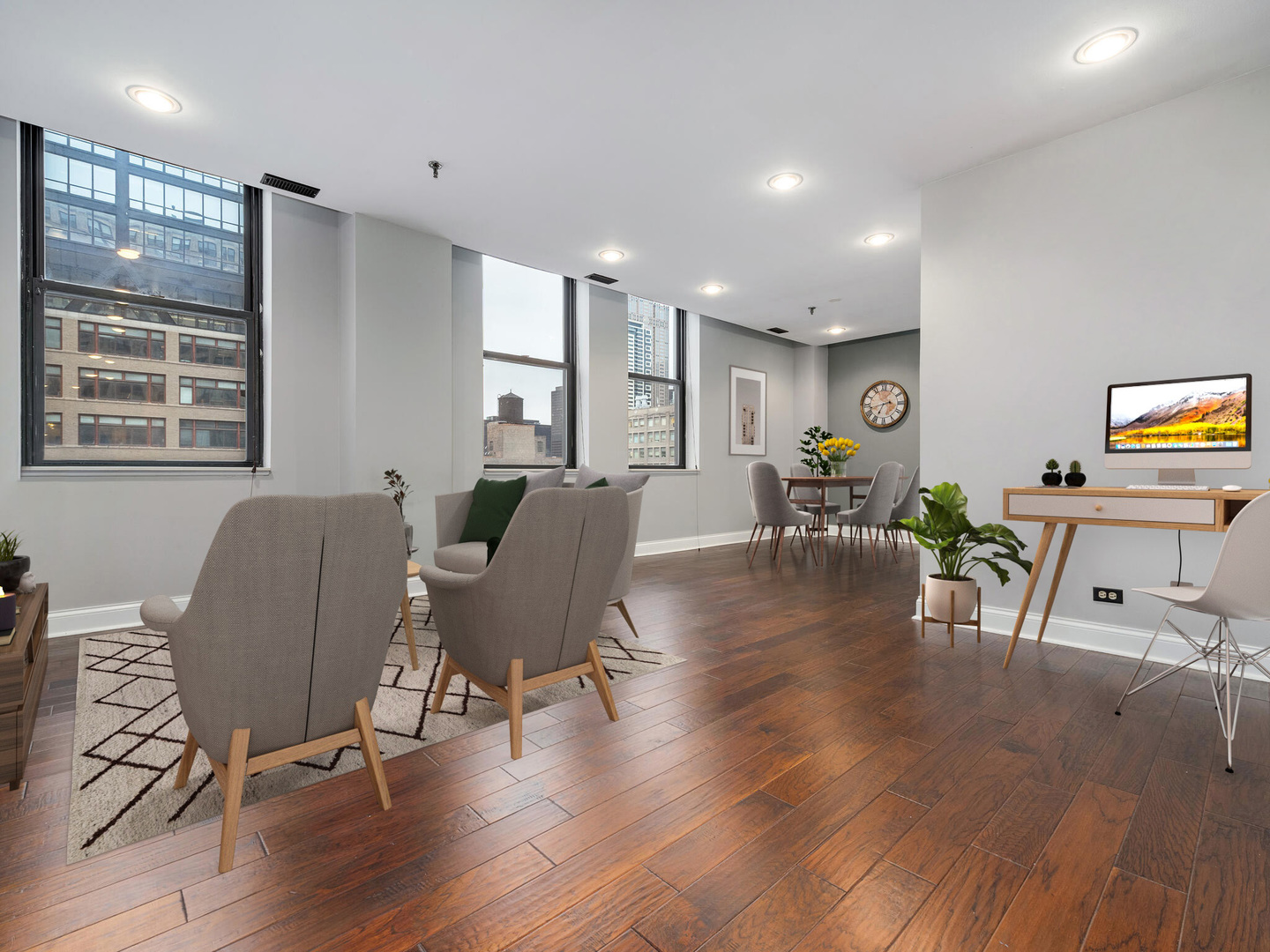 640 South Federal Street, Unit 708 Chicago, IL 60605 - Photo 9 of 20 a dining room with wooden floor a glass table and chairs