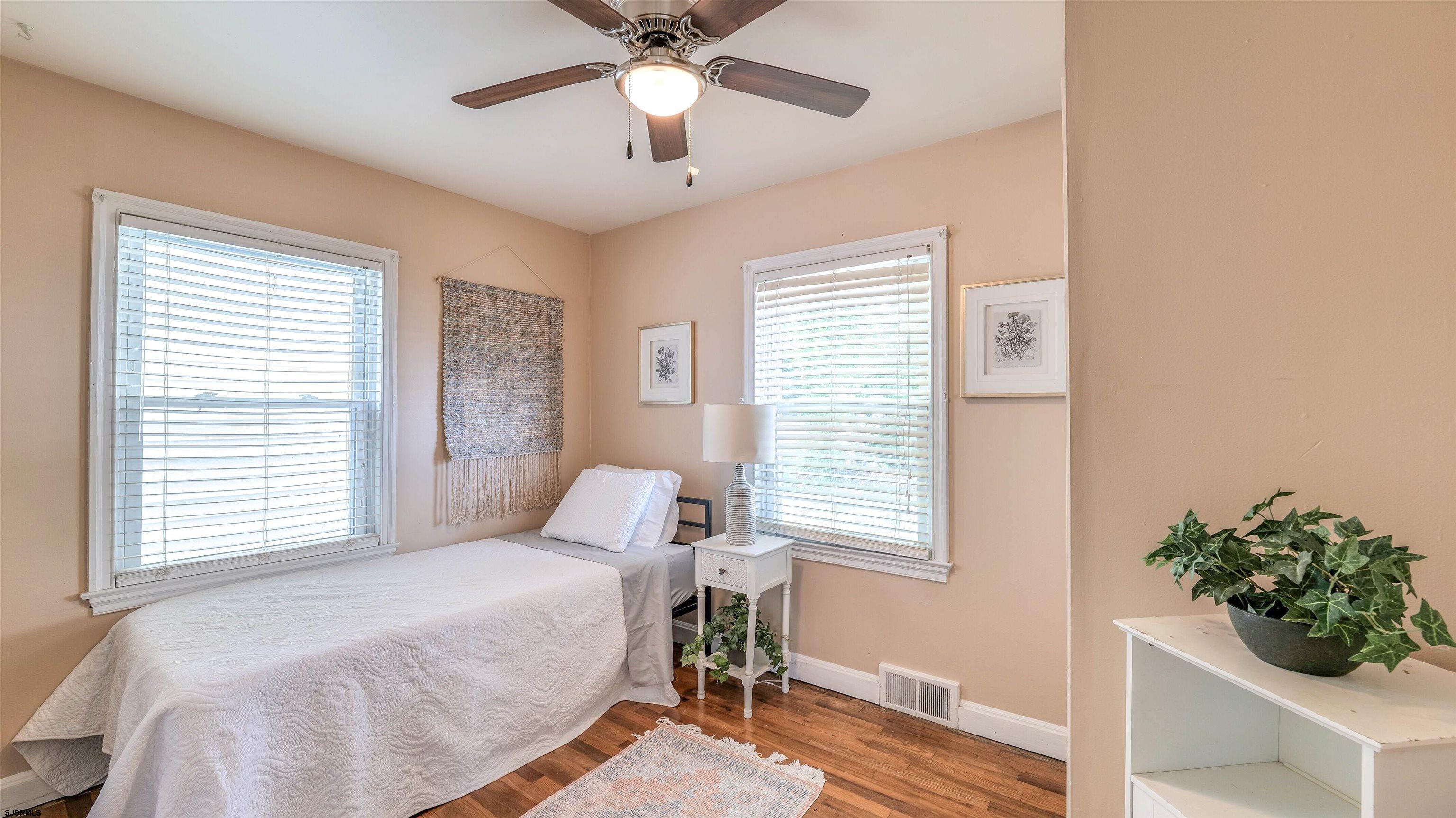 116 New Road Absecon, NJ 08201 - Photo 19 of 27 a bedroom with a bed and a window