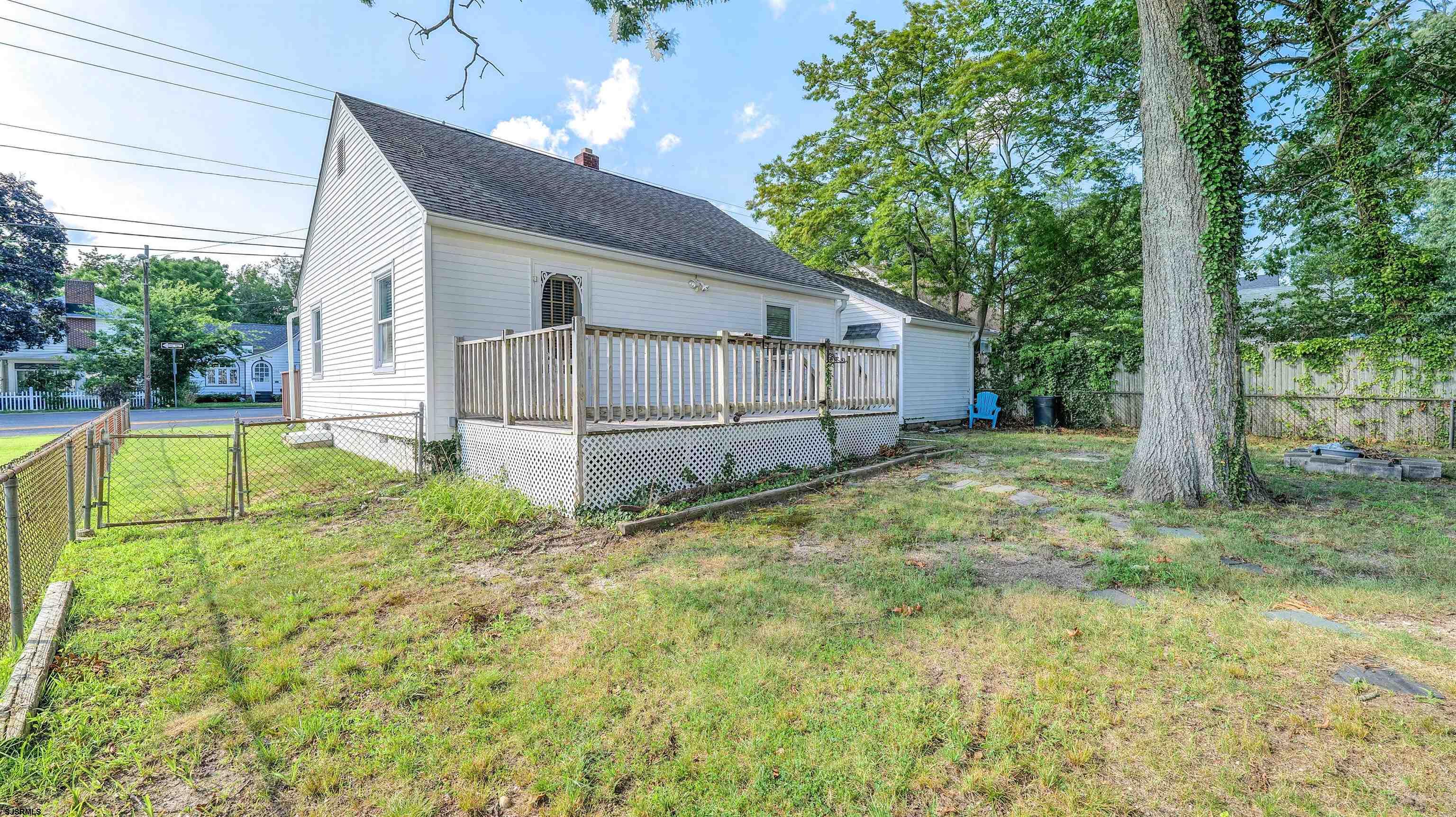 116 New Road Absecon, NJ 08201 - Photo 27 of 27 a view of backyard with small cabin and wooden fence