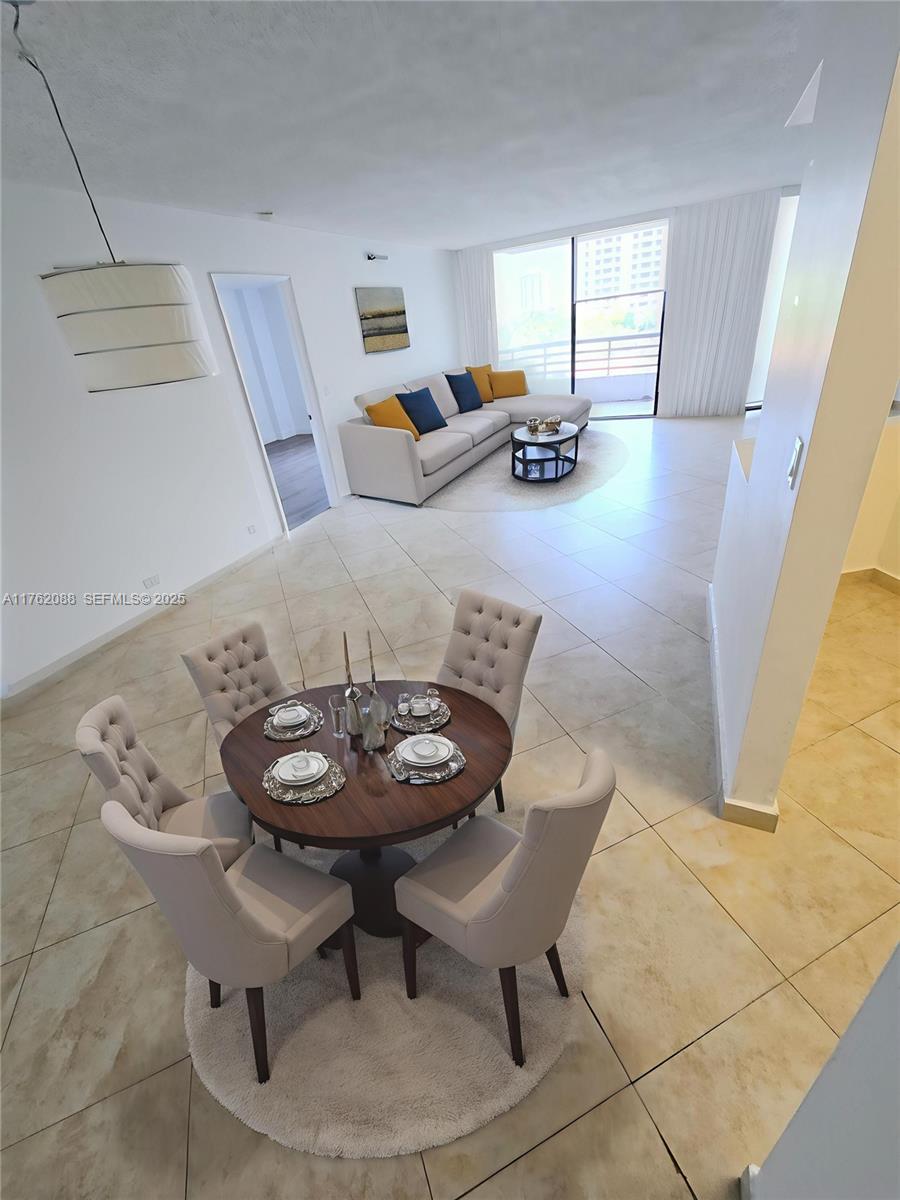 a view of a dining room with furniture