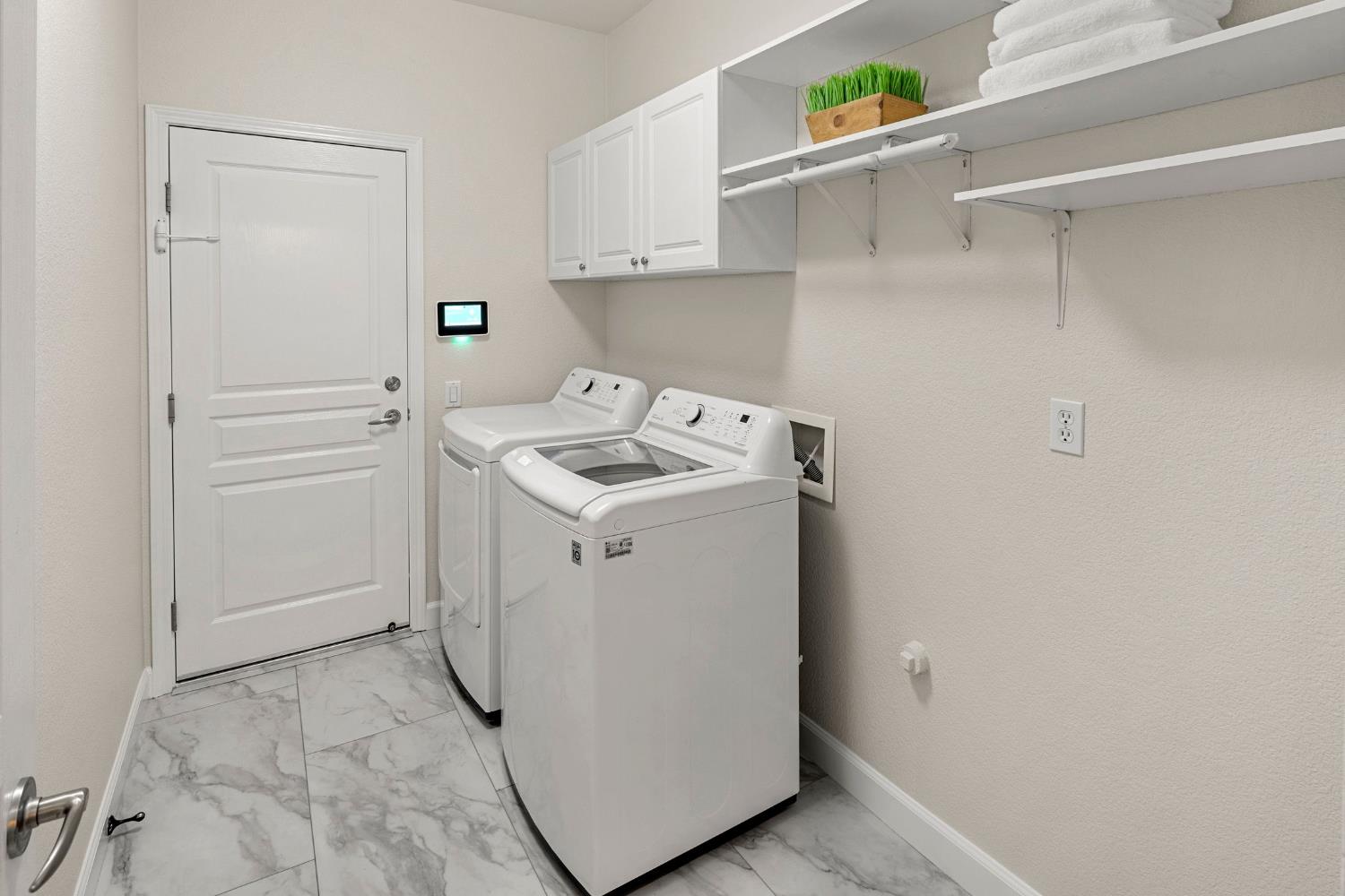 584 Rustic Ranch Lane Lincoln, CA 95648 - Photo 32 of 54 Inside Laundry Room w/ Extra Storage