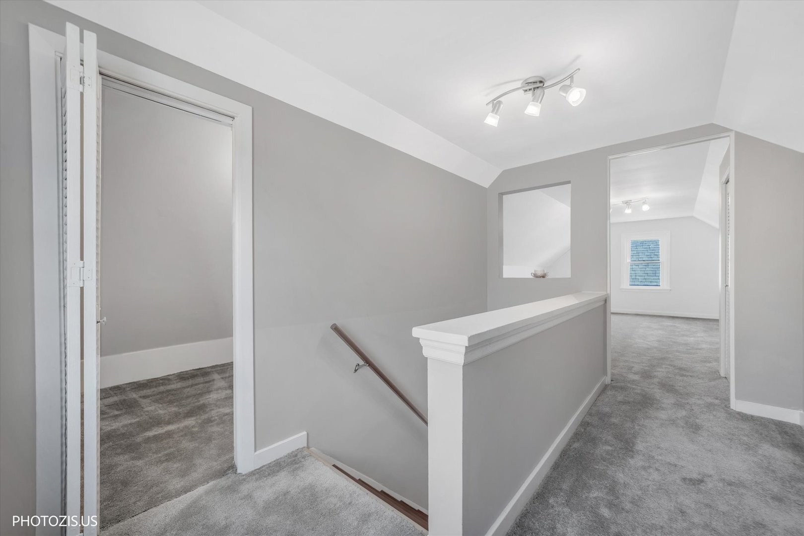 112 Pearl Street Cary, IL 60013 - Photo 16 of 25 a view of an empty room with windows and cabinet