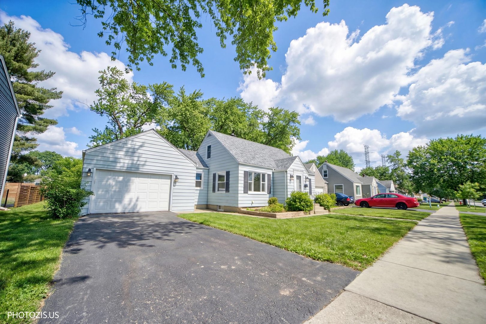 112 Pearl Street Cary, IL 60013 - Photo 2 of 25 a front view of house with yard and green space