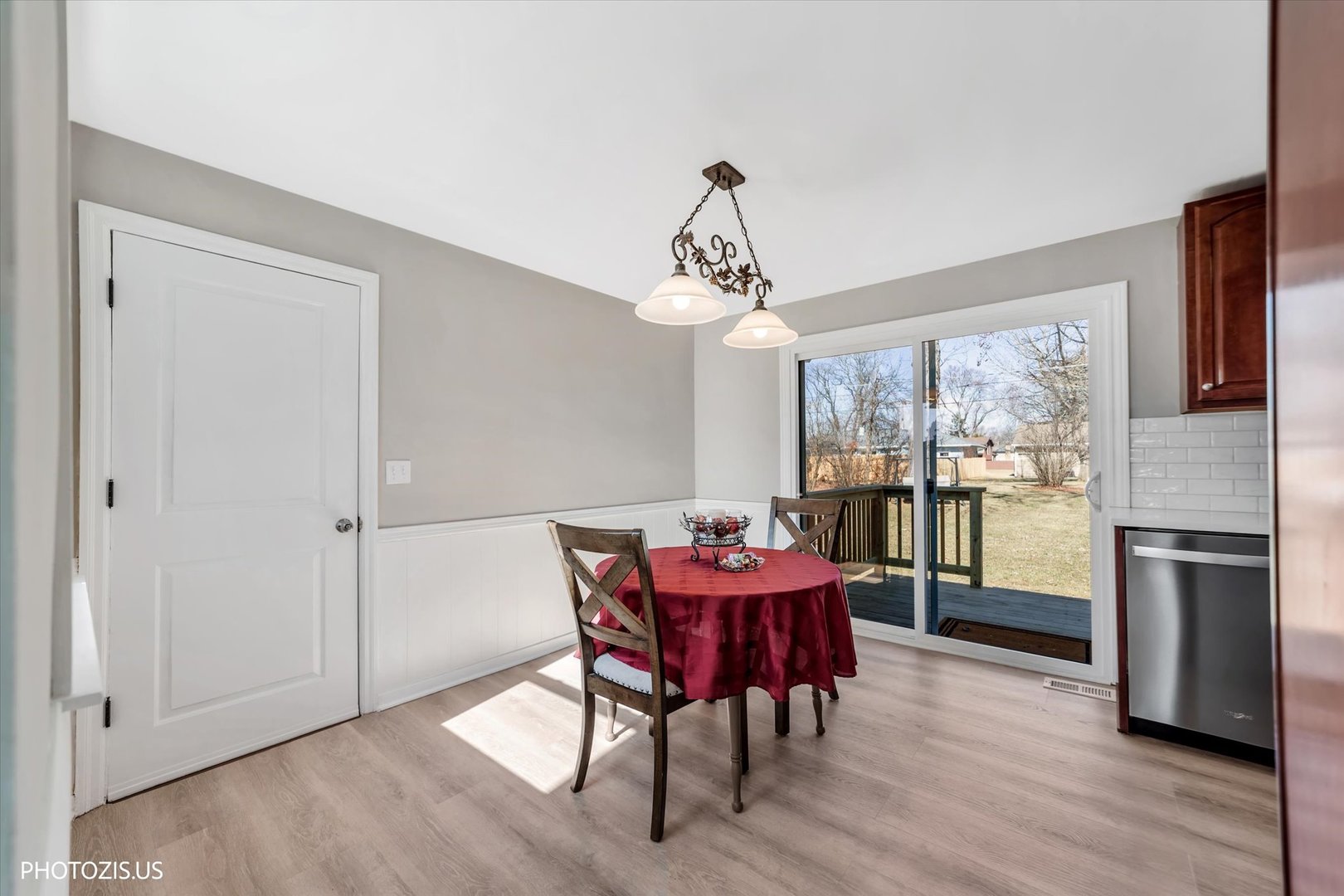 112 Pearl Street Cary, IL 60013 - Photo 5 of 25 a view of a dining room with furniture window and wooden floor