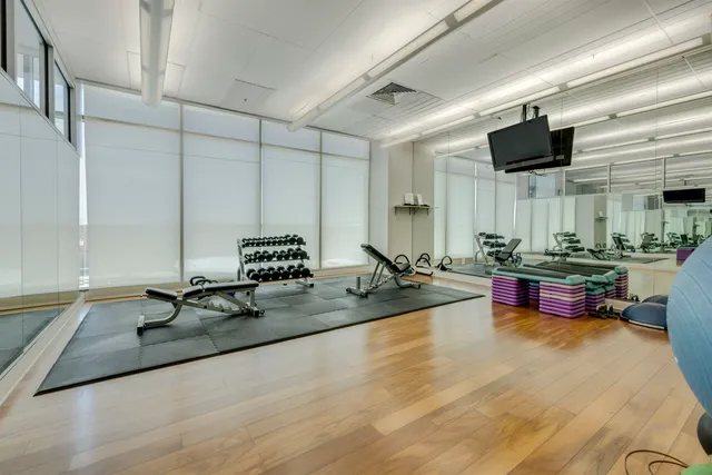 a view of a room with gym equipment