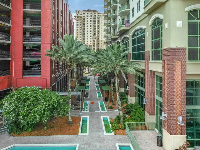 a view of a city with a lake