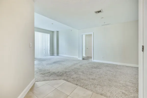an empty room with a natural light