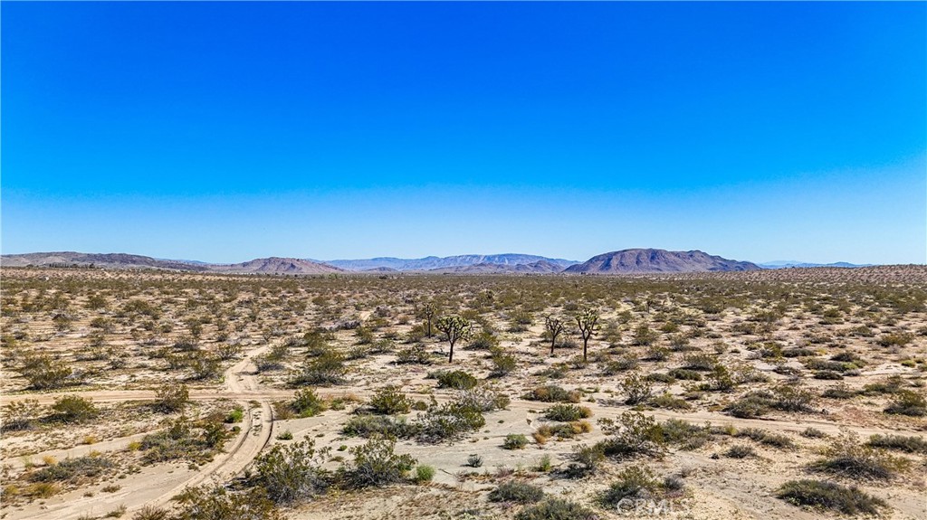 57645 Reche Road Landers, CA 92285 - Photo 13 of 38 a view of a city with a mountain in the background