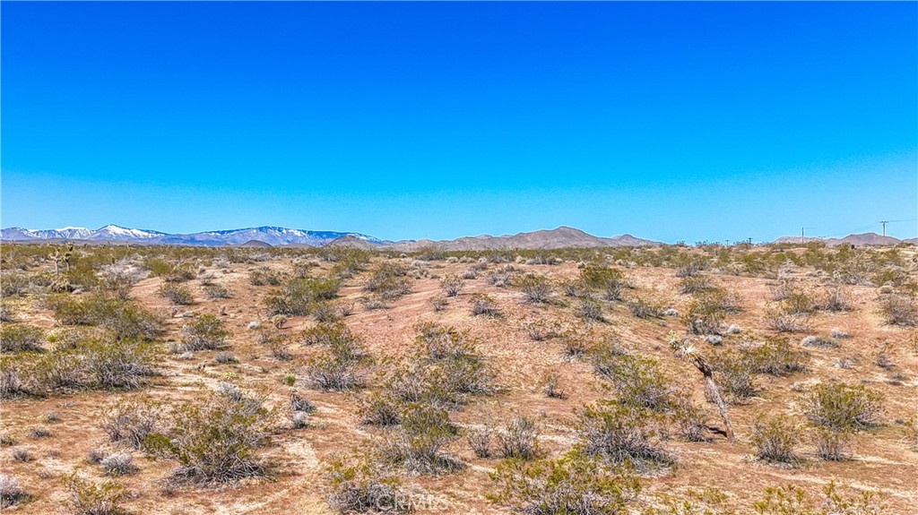 57645 Reche Road Landers, CA 92285 - Photo 35 of 38 a view of a large mountain with mountains in the background