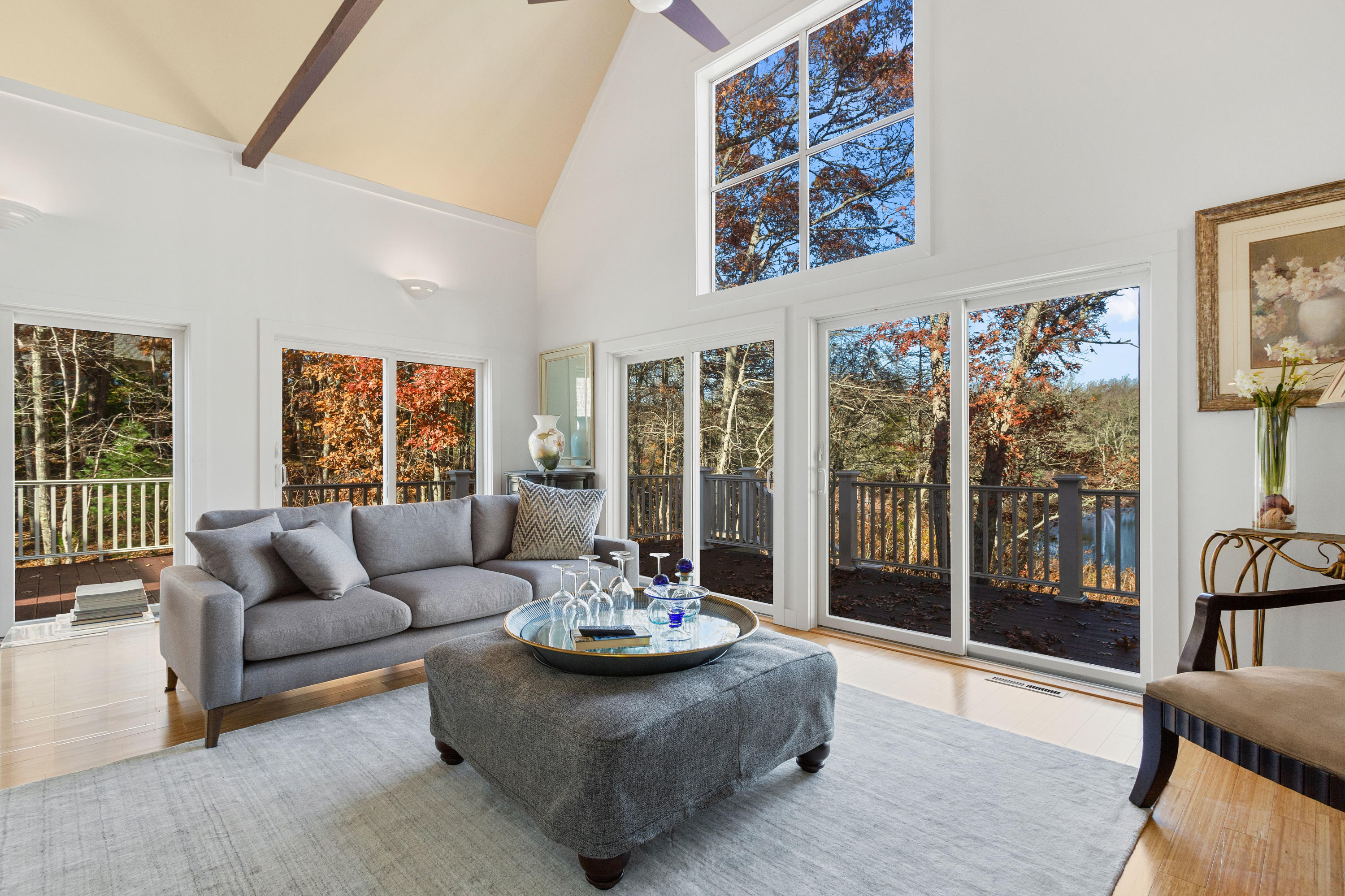 205 Uncle Percy's Road Mashpee, MA 02649 - Photo 12 of 54 a living room with furniture and a large window