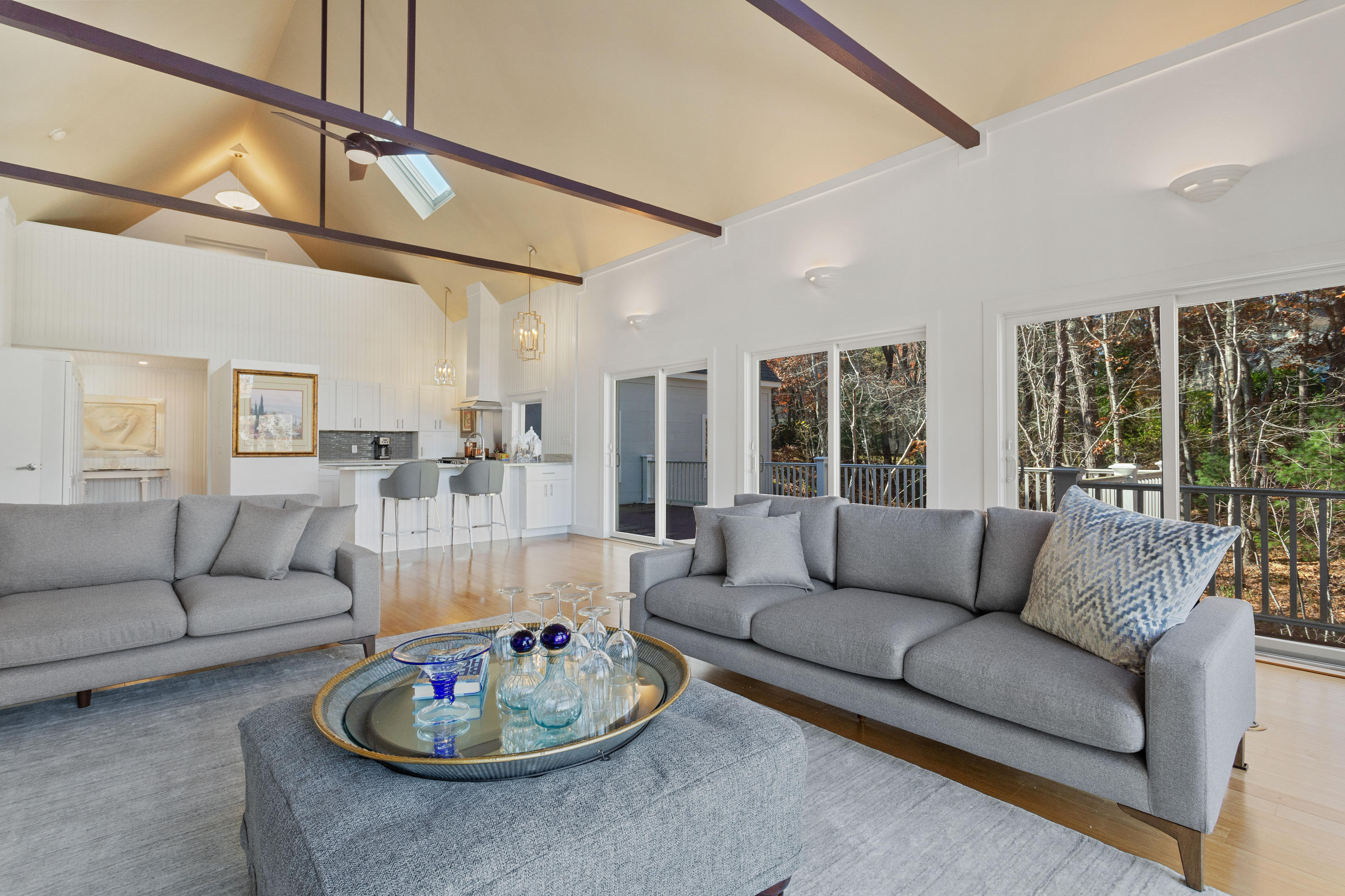 205 Uncle Percy's Road Mashpee, MA 02649 - Photo 13 of 54 a living room with furniture and a large window