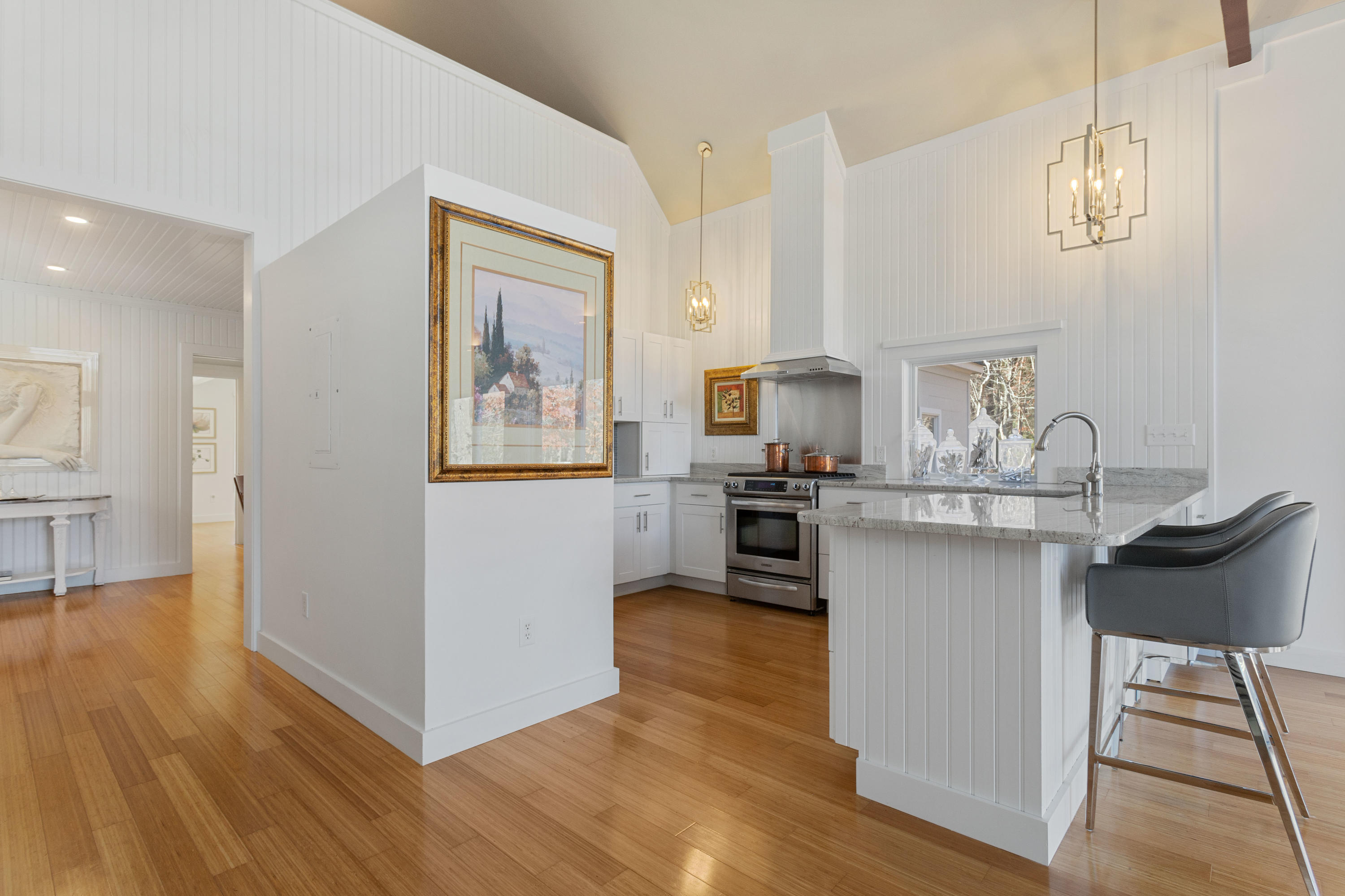 205 Uncle Percy's Road Mashpee, MA 02649 - Photo 14 of 54 a kitchen with a refrigerator and a stove top oven