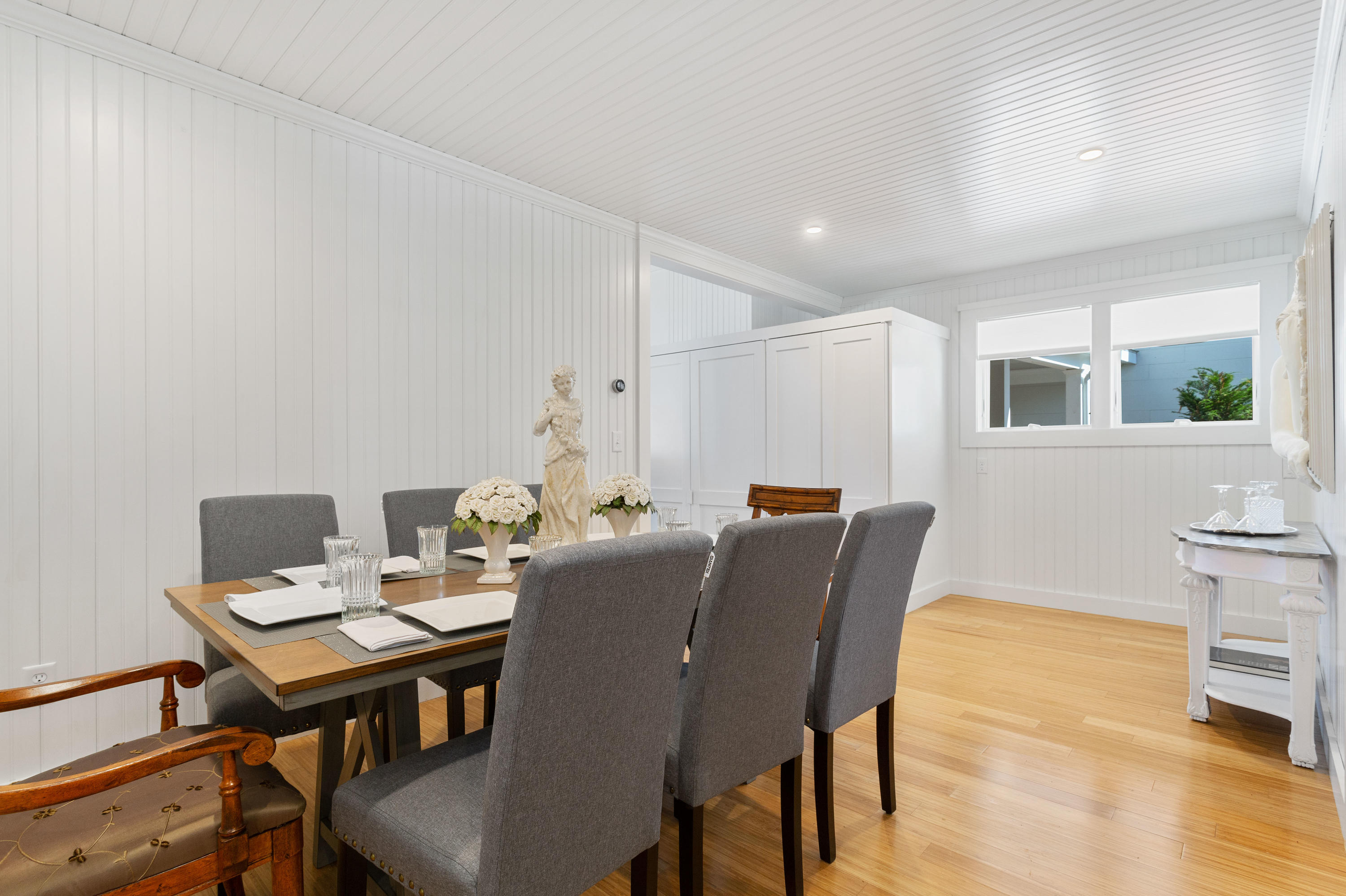 205 Uncle Percy's Road Mashpee, MA 02649 - Photo 19 of 54 a view of a dining room with furniture and wooden floor