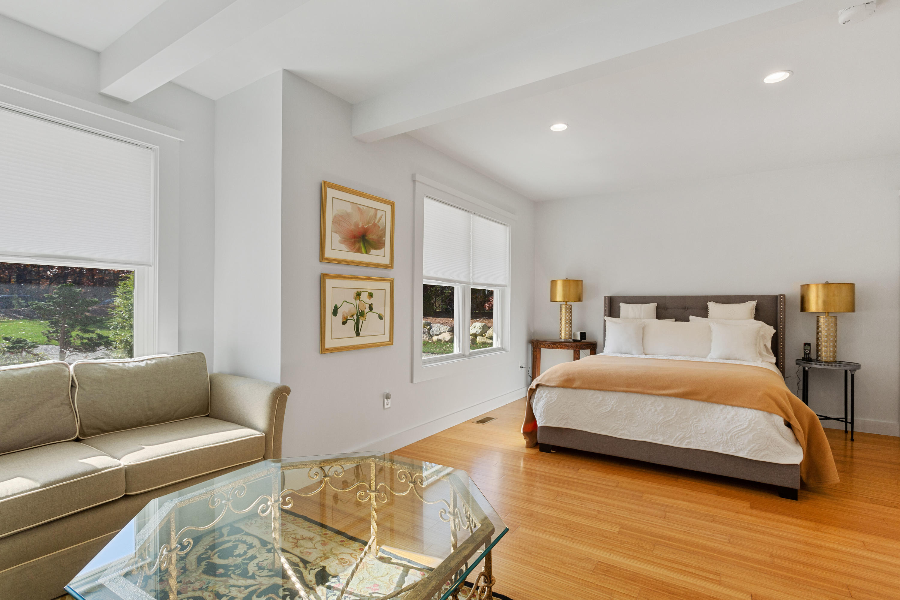 205 Uncle Percy's Road Mashpee, MA 02649 - Photo 24 of 54 a bedroom with a bed and wooden floor