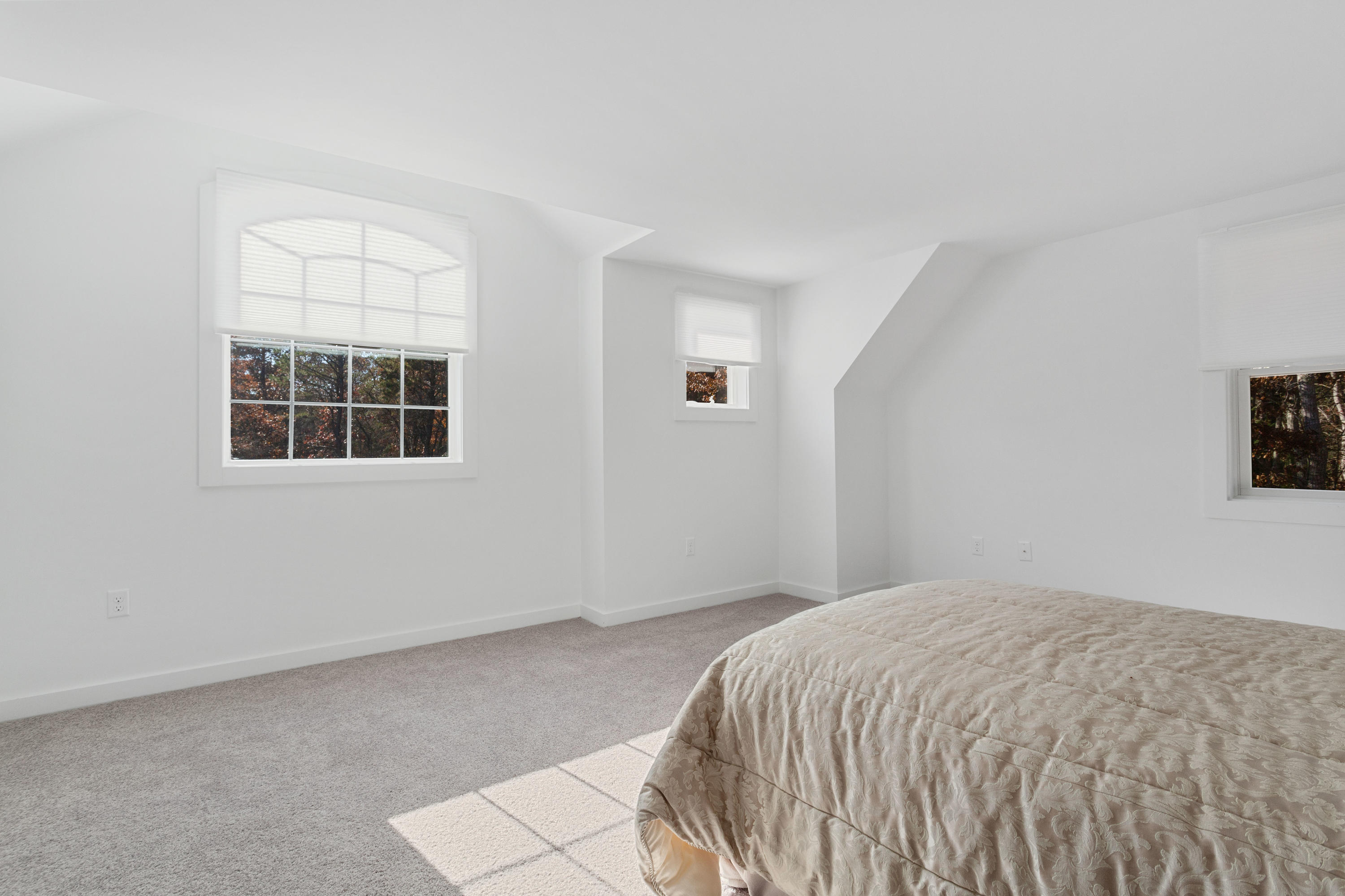 205 Uncle Percy's Road Mashpee, MA 02649 - Photo 27 of 54 a bedroom with a bed and a window