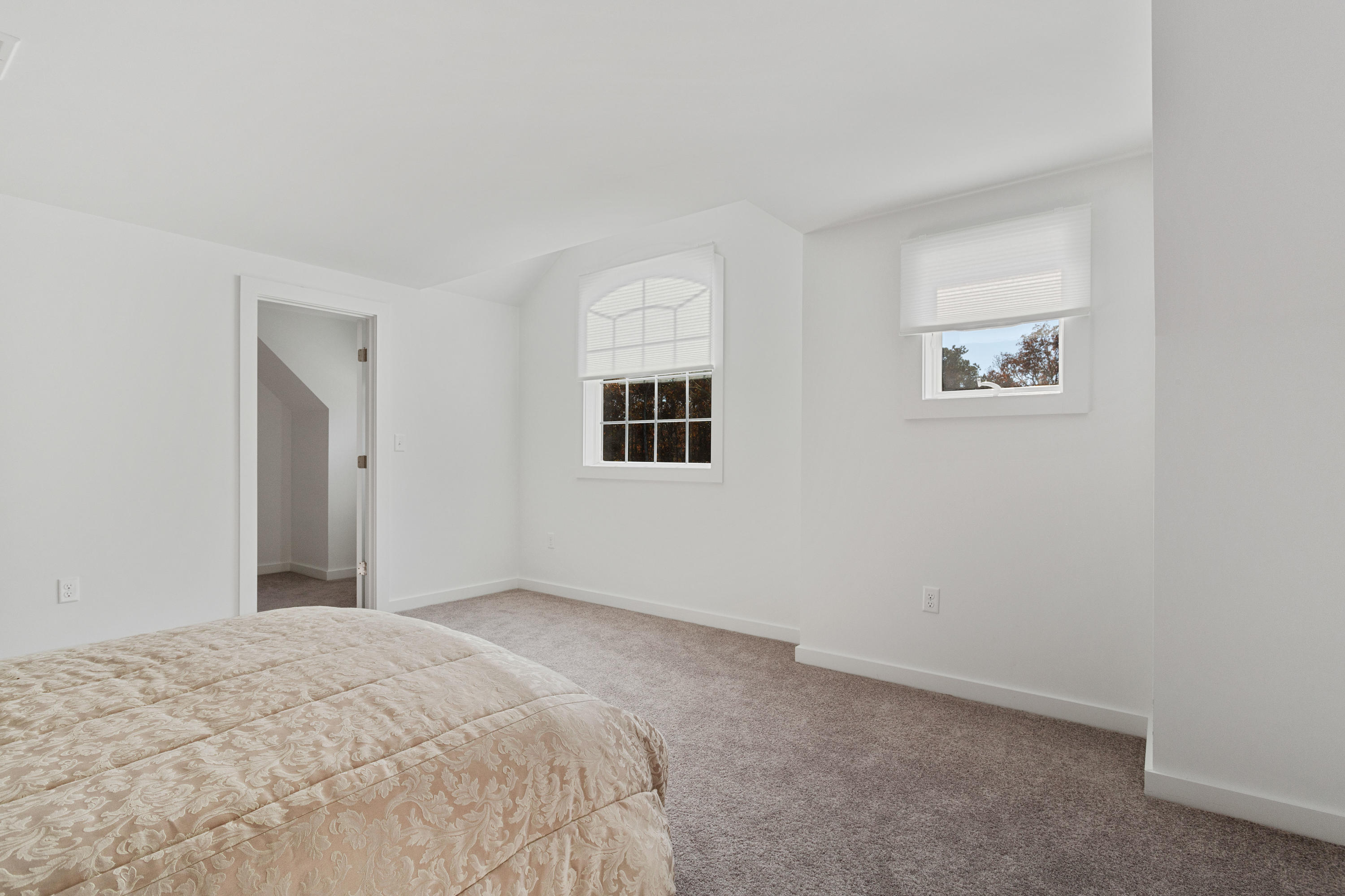205 Uncle Percy's Road Mashpee, MA 02649 - Photo 28 of 54 a bedroom with a bed and a window