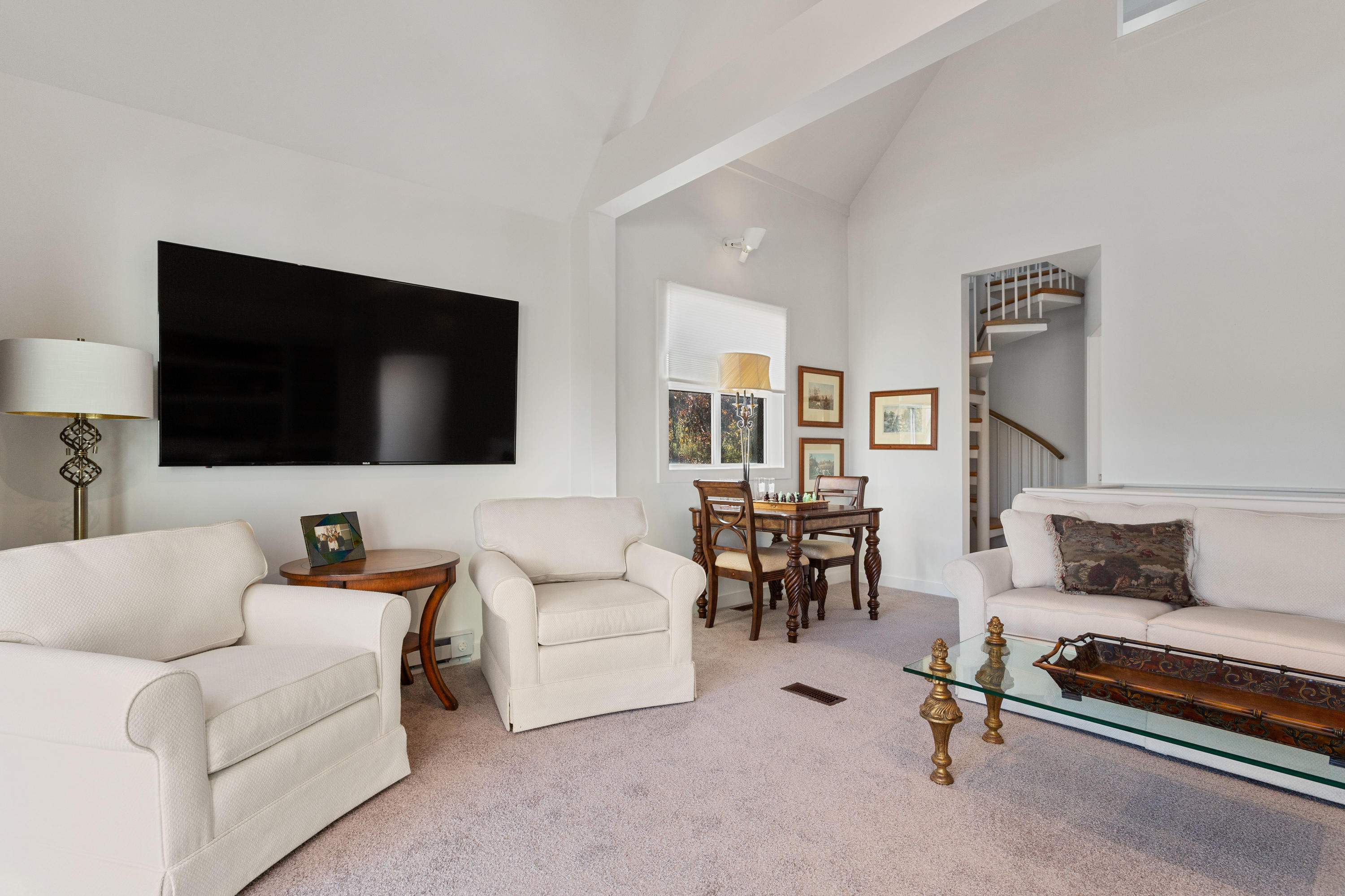 205 Uncle Percy's Road Mashpee, MA 02649 - Photo 34 of 54 a living room with furniture and a flat screen tv