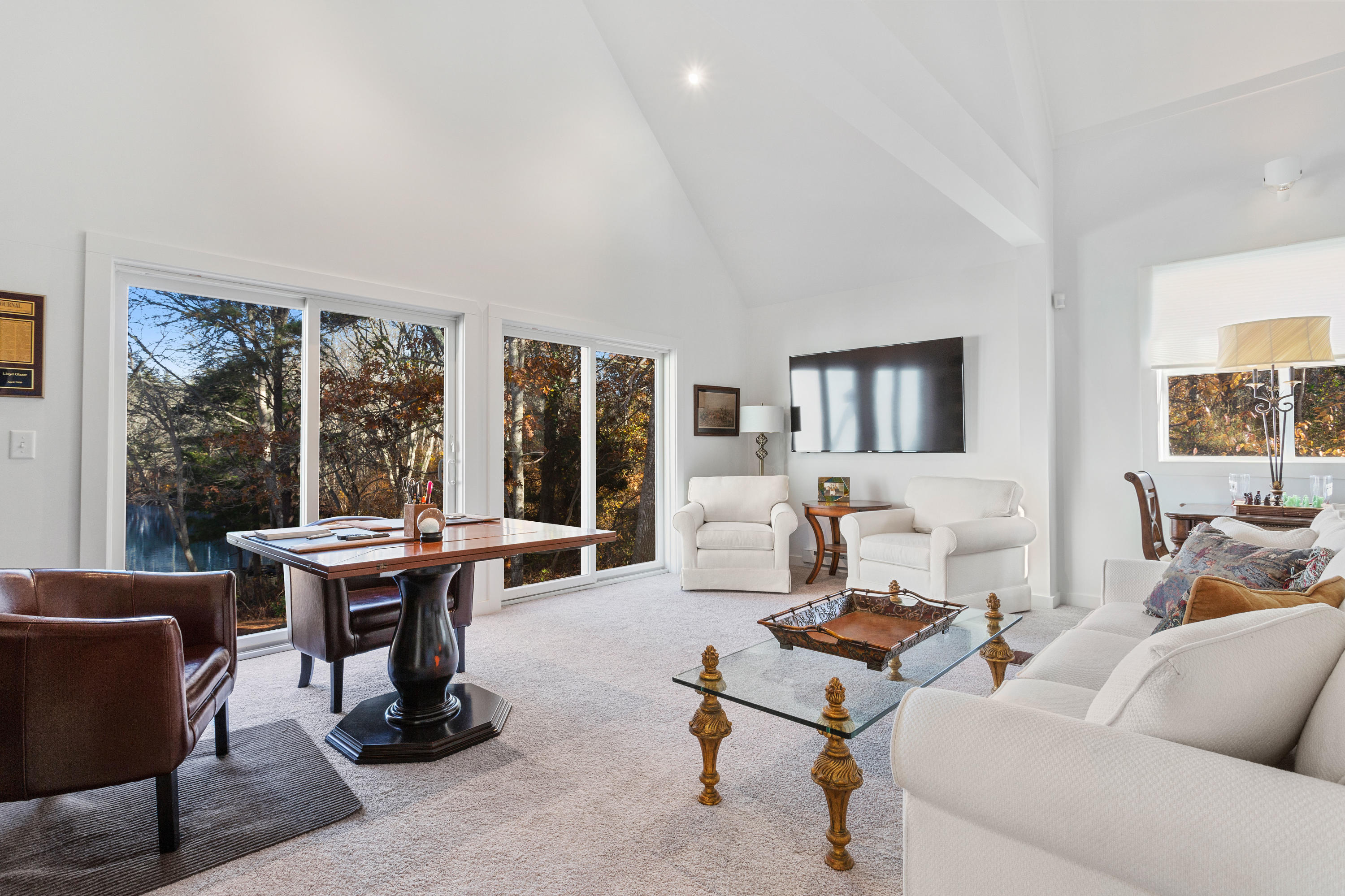 205 Uncle Percy's Road Mashpee, MA 02649 - Photo 35 of 54 a living room with furniture and large windows