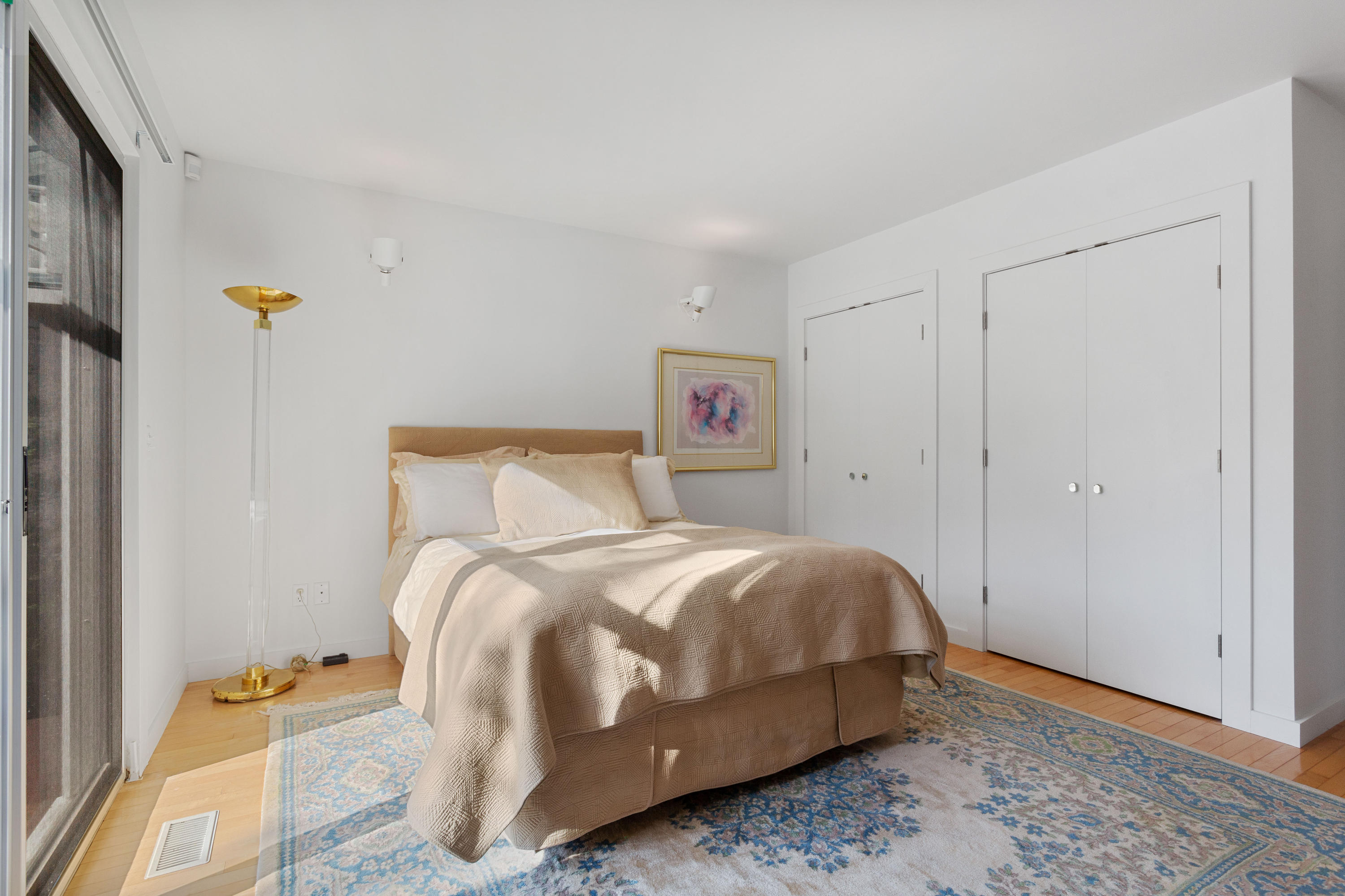 205 Uncle Percy's Road Mashpee, MA 02649 - Photo 41 of 54 a bedroom with a bed and wooden floor