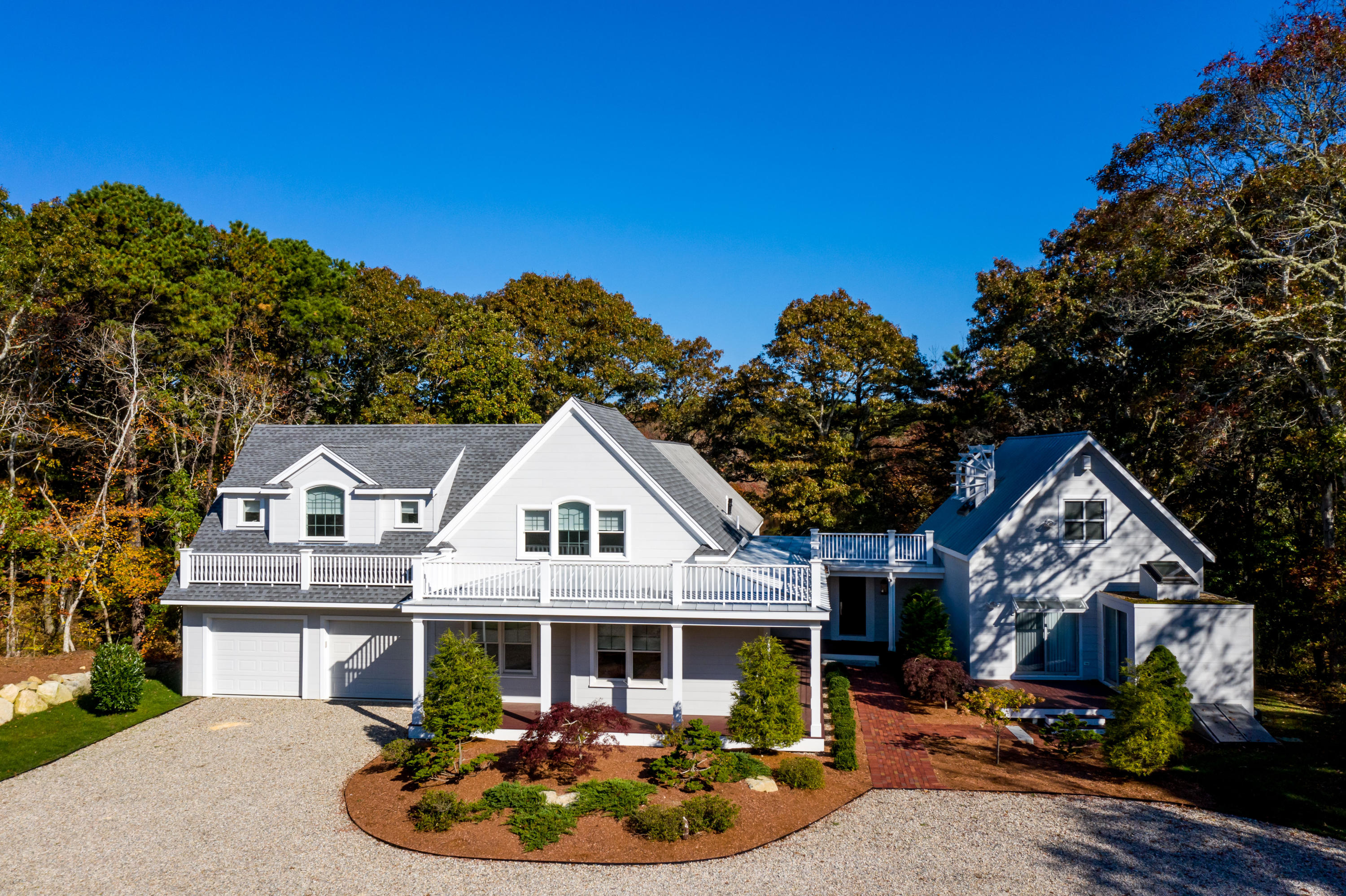 205 Uncle Percy's Road Mashpee, MA 02649 - Photo 52 of 54 a front view of a house with garden